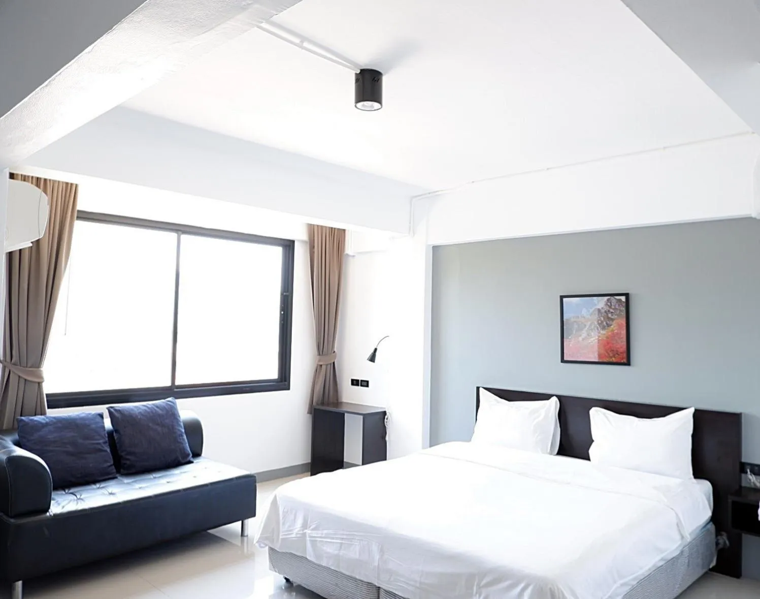 Bed in Izen Budget Hotel & Residence