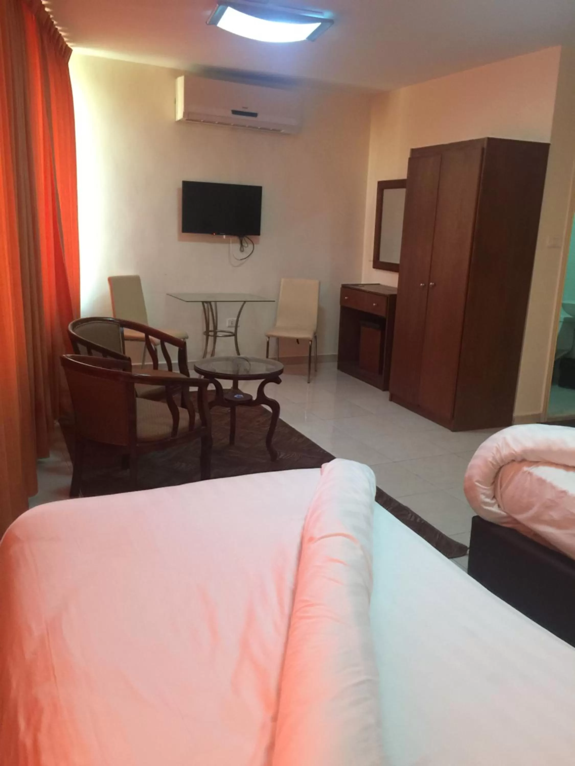 Bed in Zaina Plaza Hotel