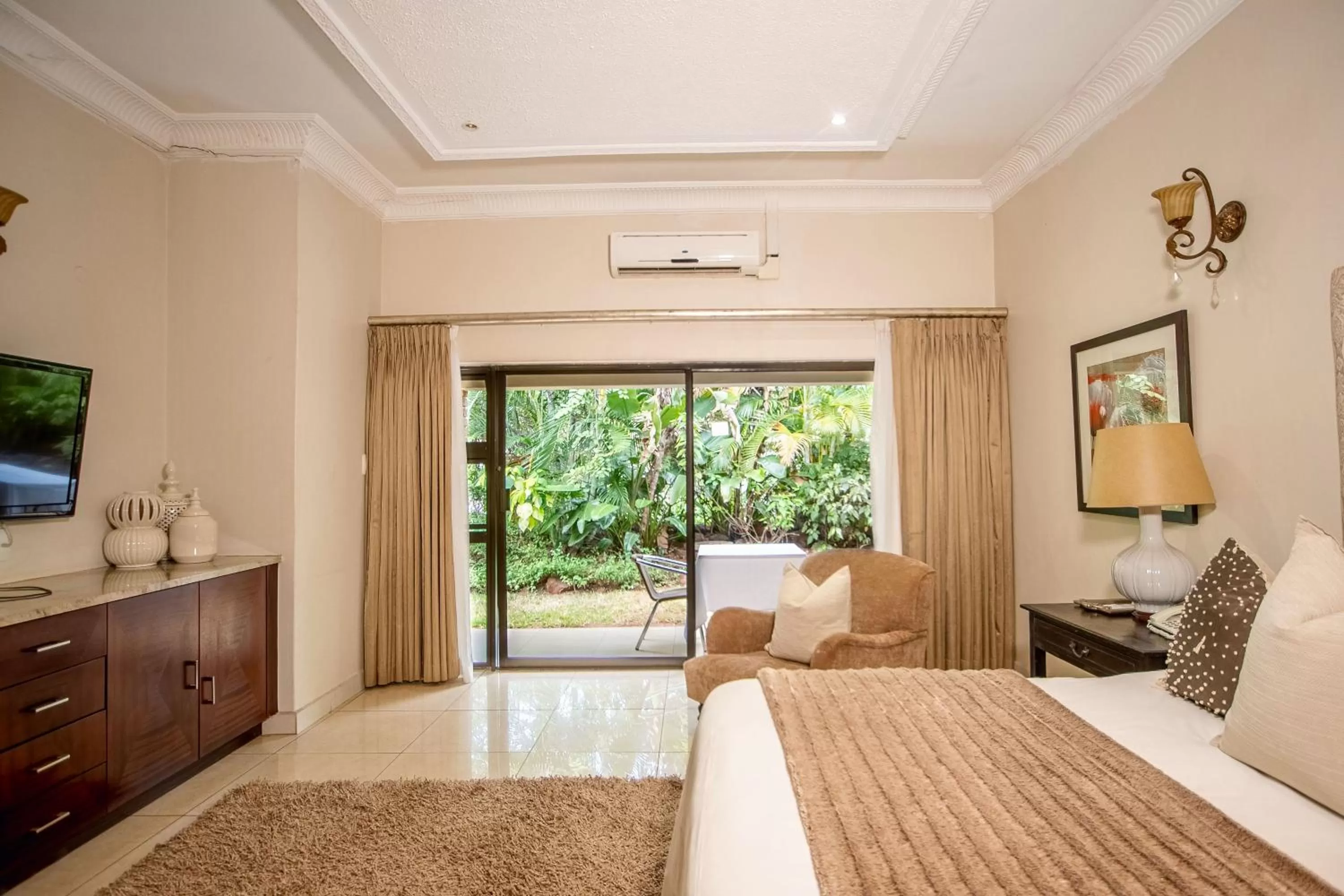 Photo of the whole room, Bed in The Victoria Falls Deluxe Suites