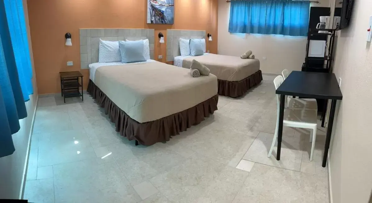 Comfort Quadruple Room in Aqua by Dreams Hotel Comfort Quadruple Room in Aqua by Dreams Hotel