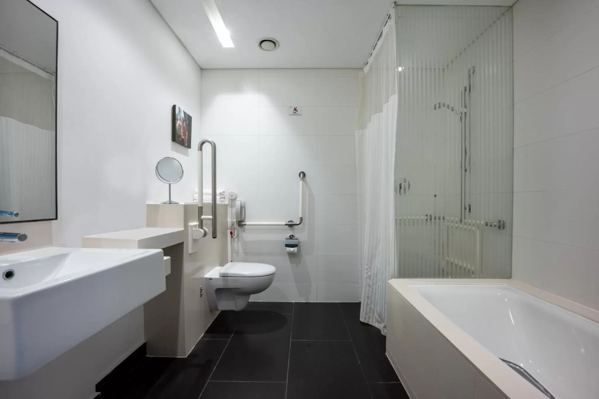 Bathroom in Crowne Plaza Tel Aviv City Center by IHG