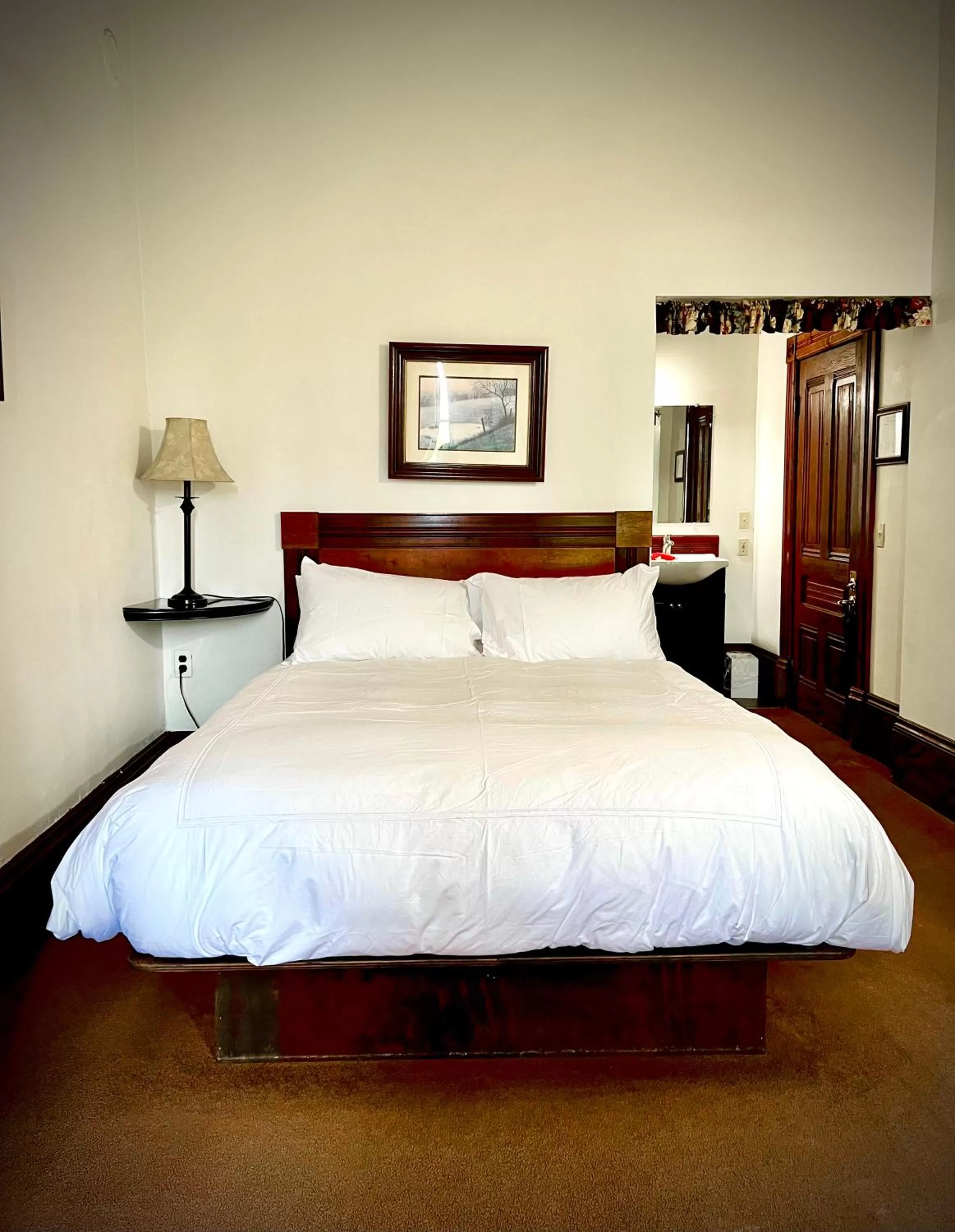 Bed in The Monarch Hotel