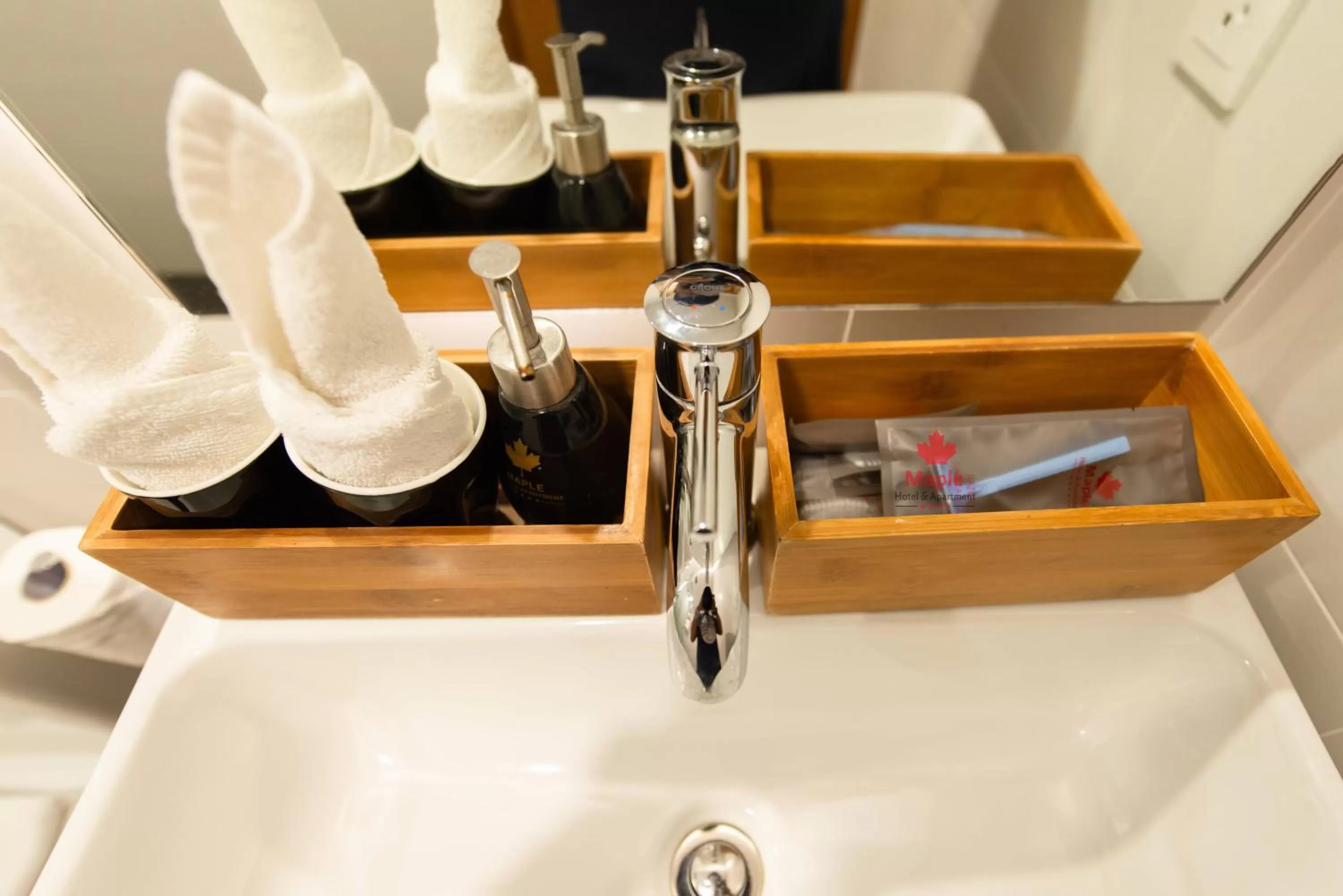 Toilet in Maple Hotel & Apartment