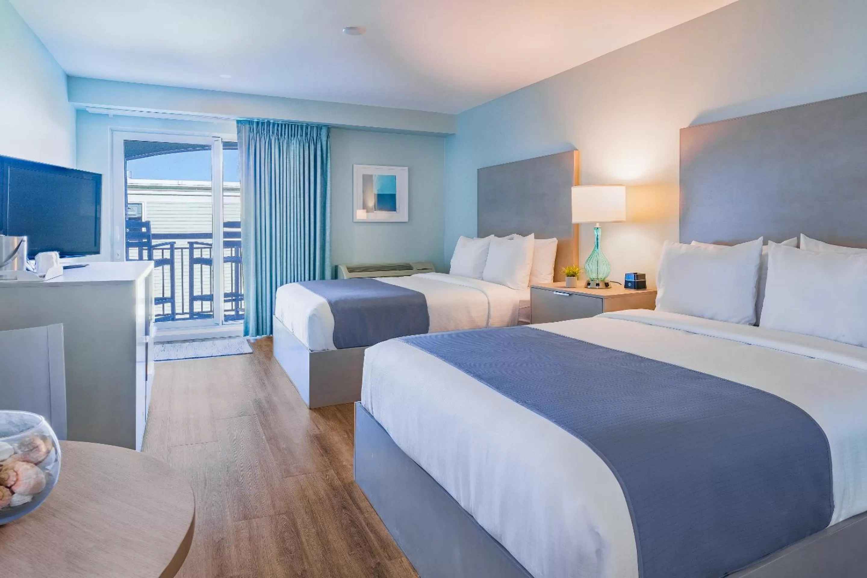 Bed in The Palms Oceanfront Hotel