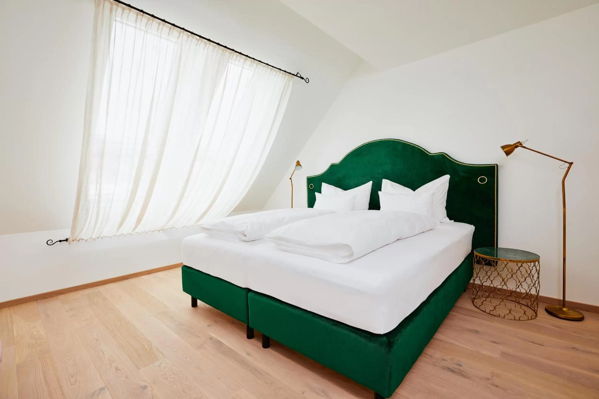 Photo of the whole room, Bed in Boutiquehotel Zum Goldenen Hirschen