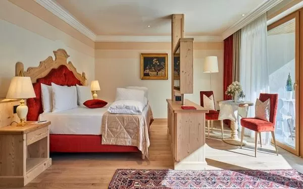 Bed in Hotel Sassongher