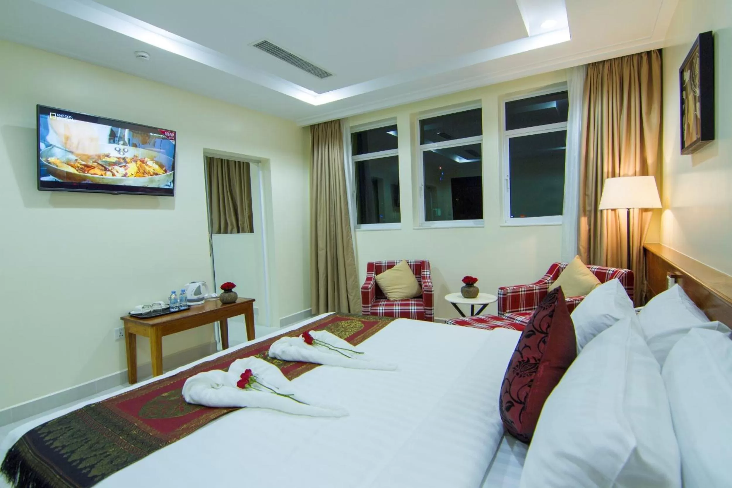 TV and multimedia, Bed in Rose Emerald Hotel