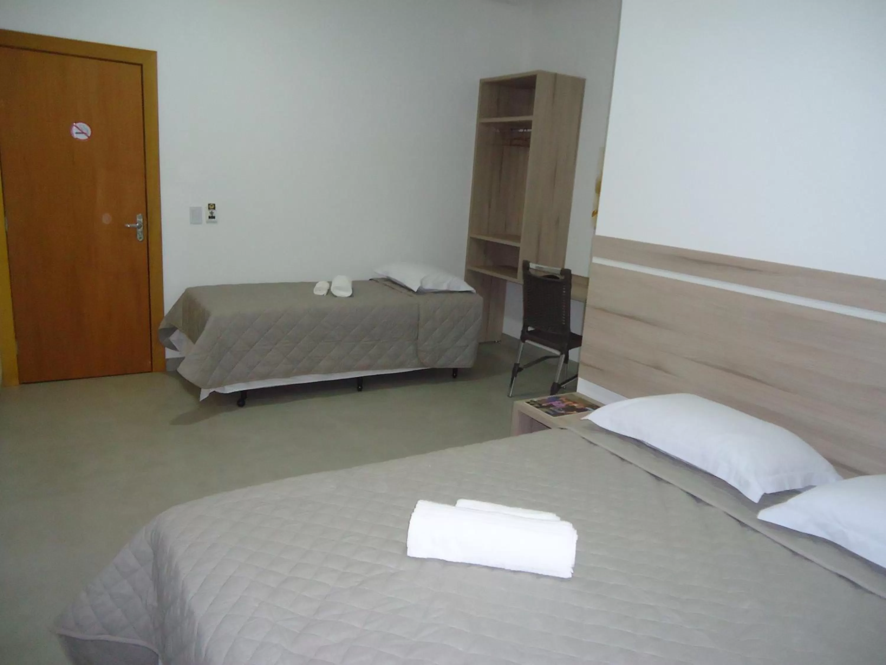 Bed in Hotel Jequitibá