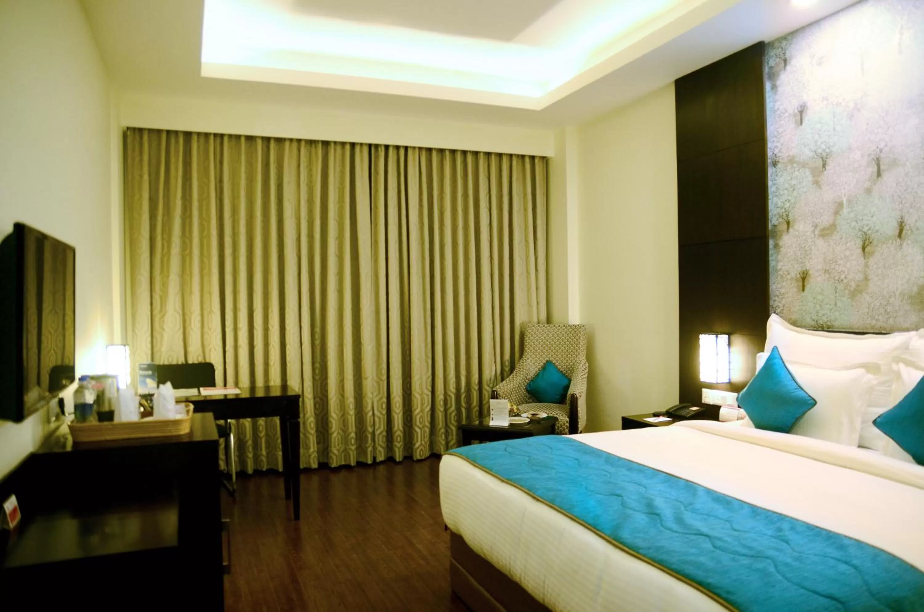Photo of the whole room, Bed in Ramada Jamshedpur Bistupur