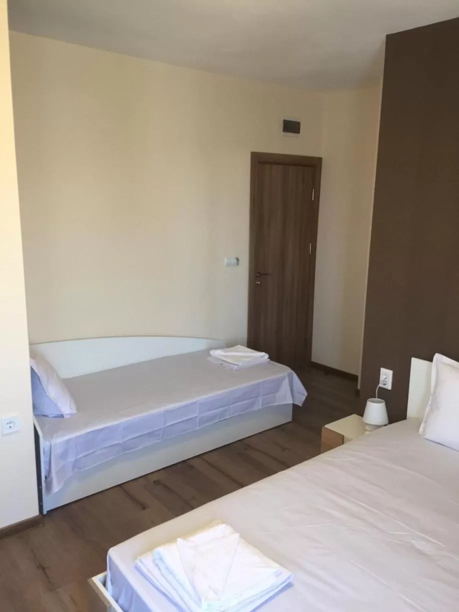 Bed in Family Hotel Malibu