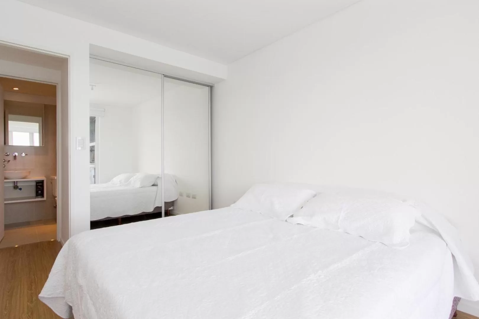 Bed in De la Costa Apartamentos