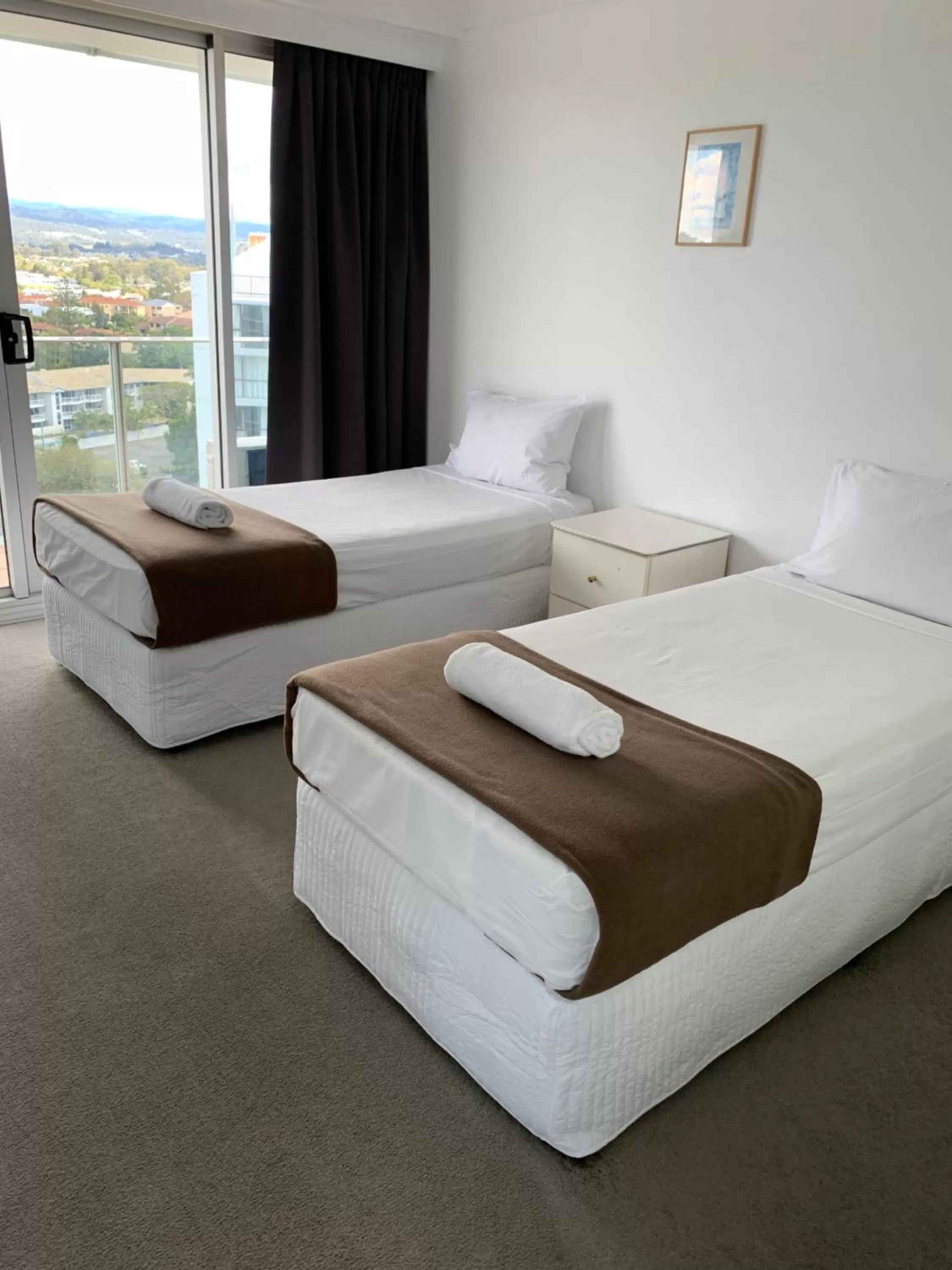 Bedroom, Bed in Pacific Regis Beachfront Holiday Apartments