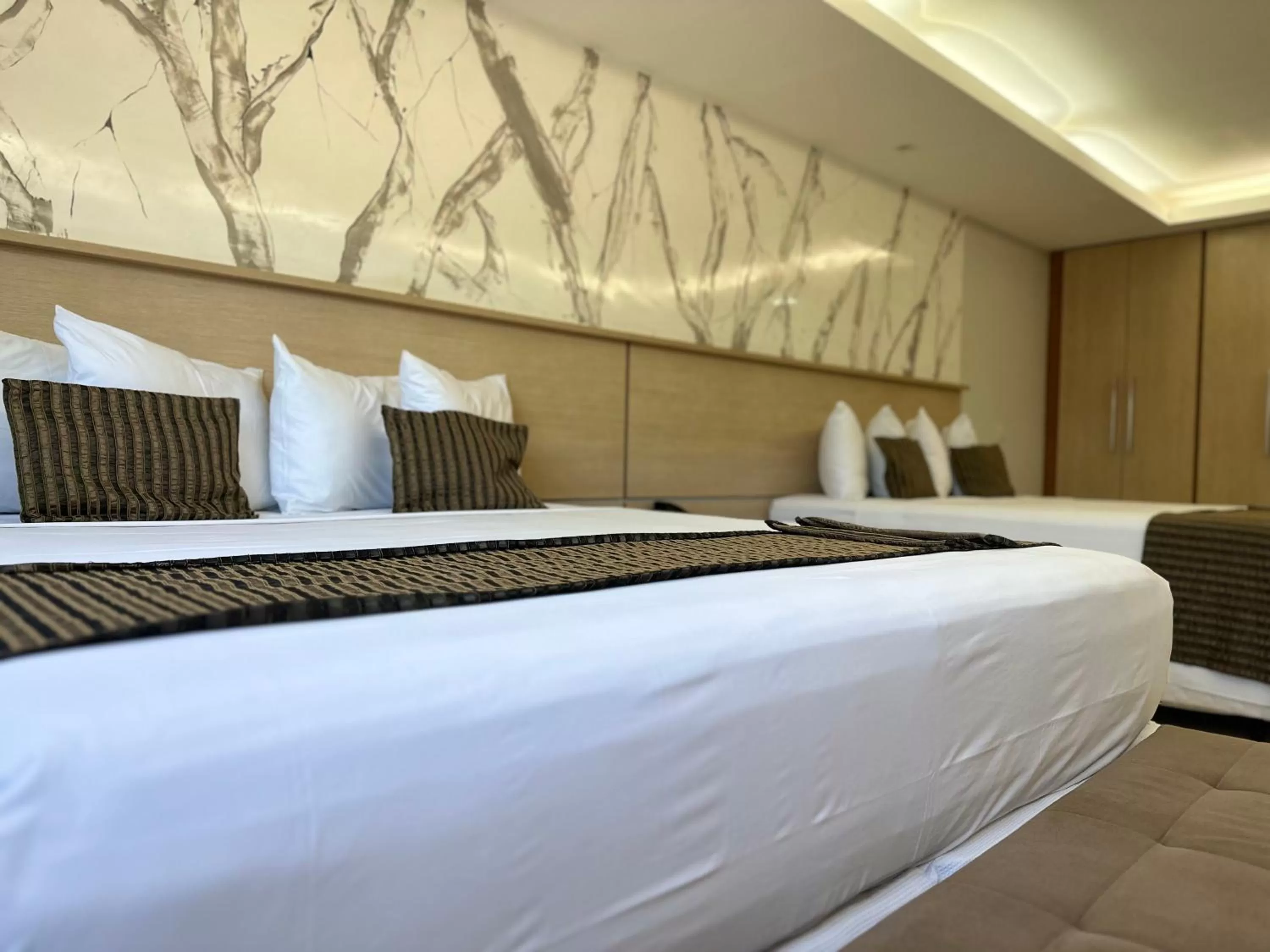 Bed in Atrium Confort Hotels