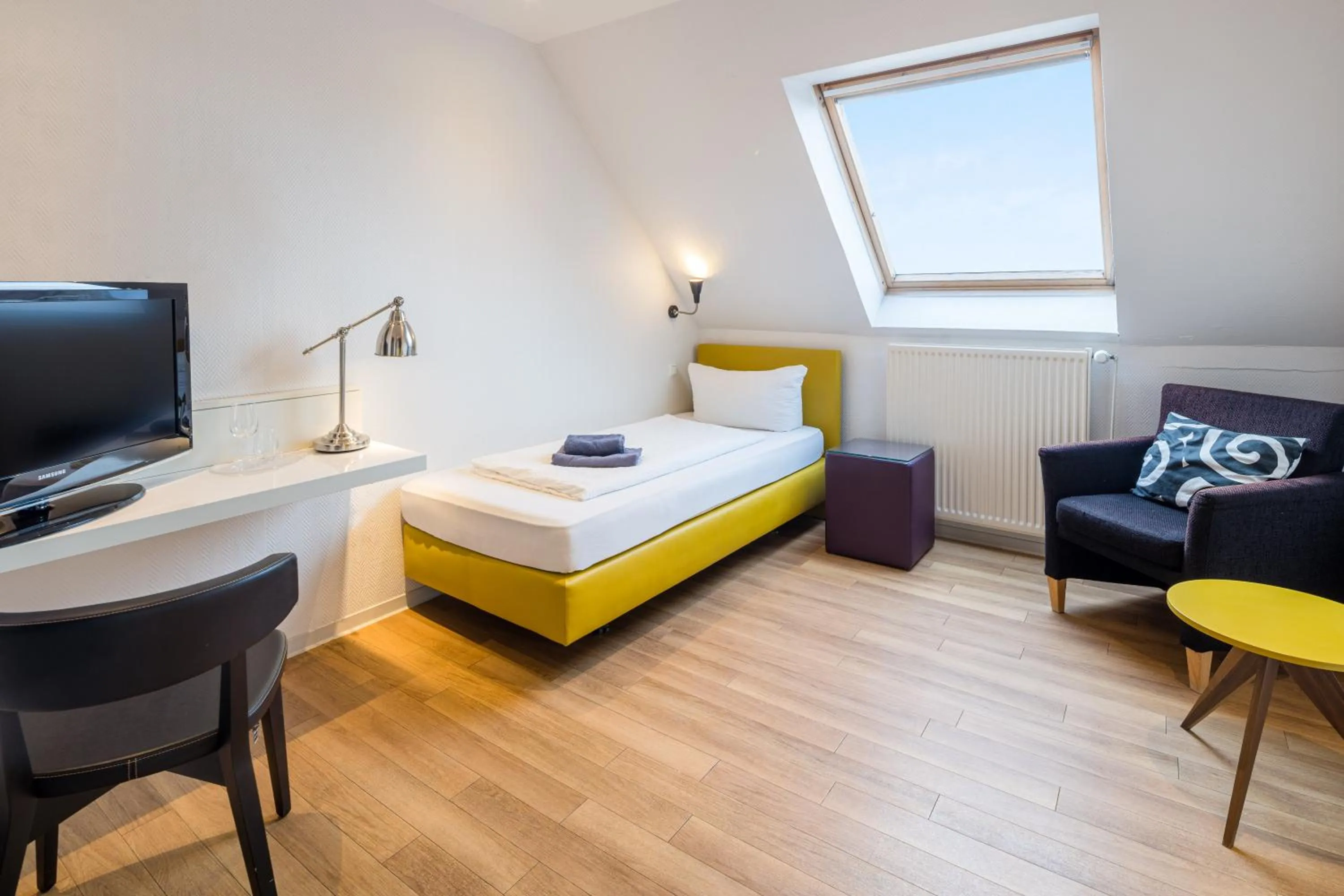 Living room, Bed in Strandhotel Achtert Diek