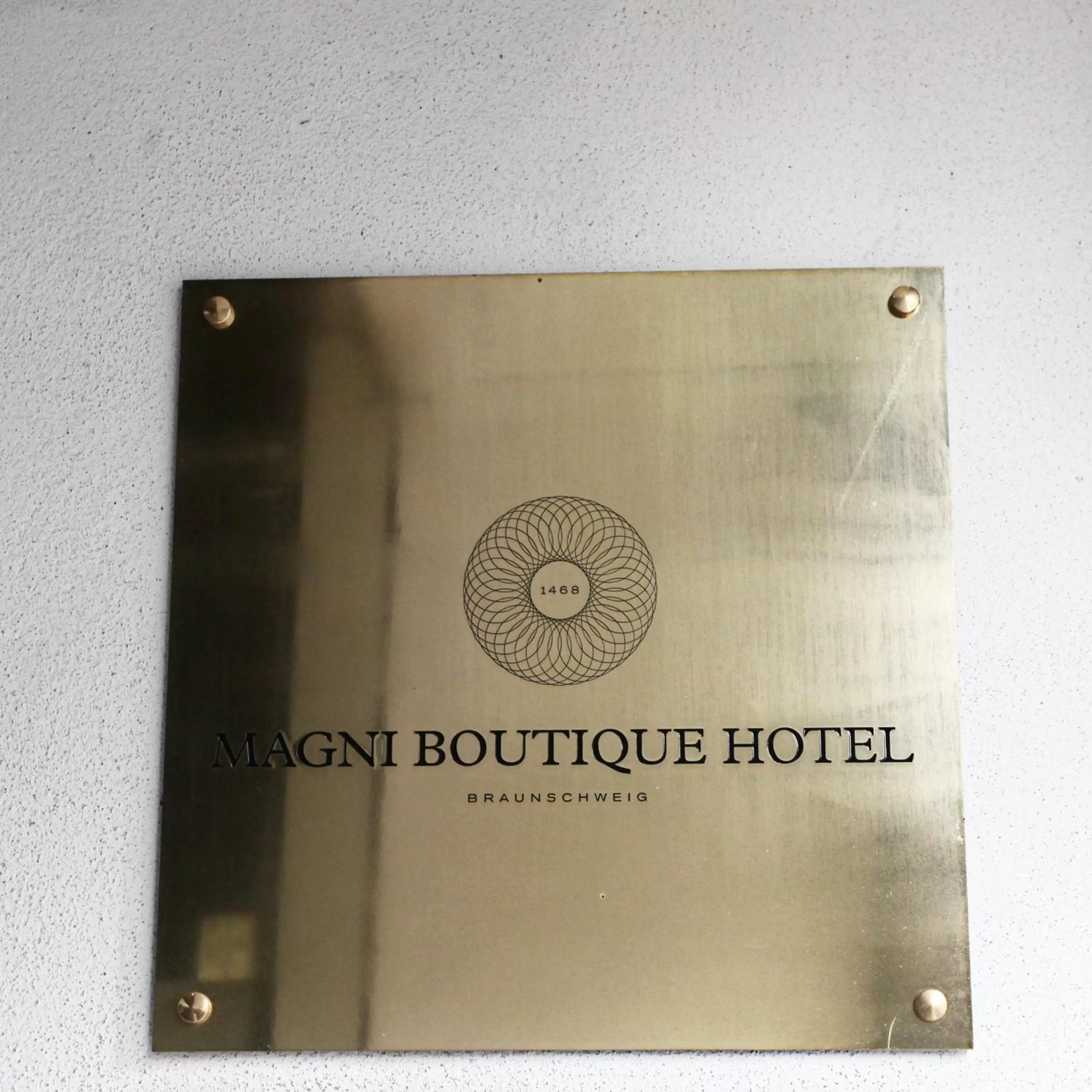 Property logo or sign in Magni Boutique Hotel