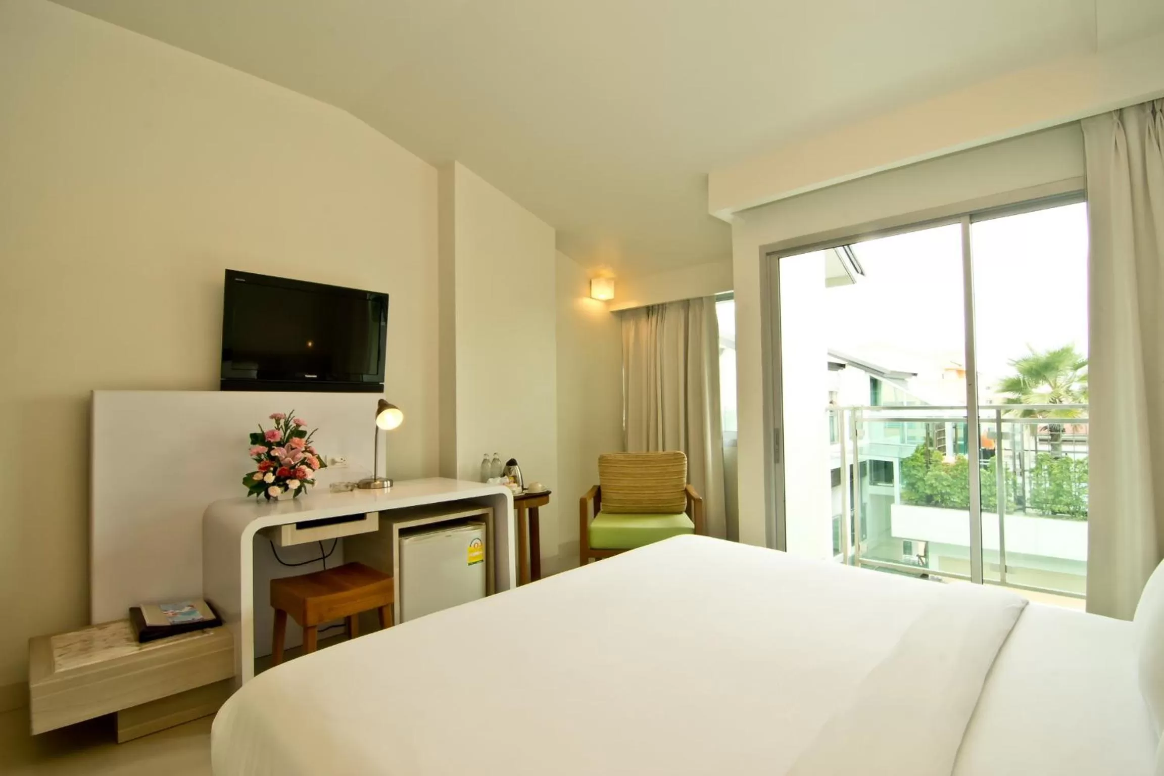 Bed in Sunshine Hotel & Residences