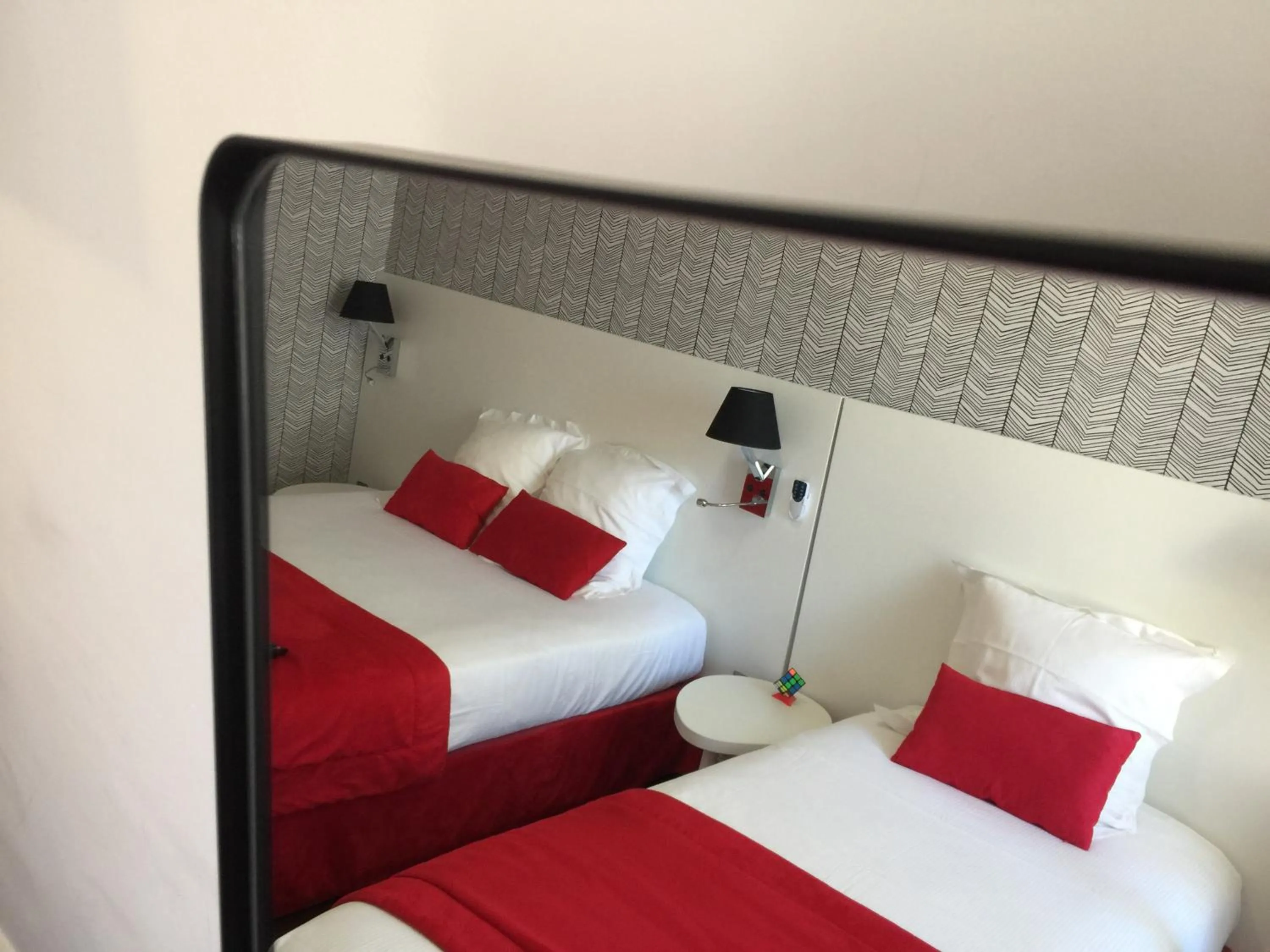 Bed in Hôtel Concorde