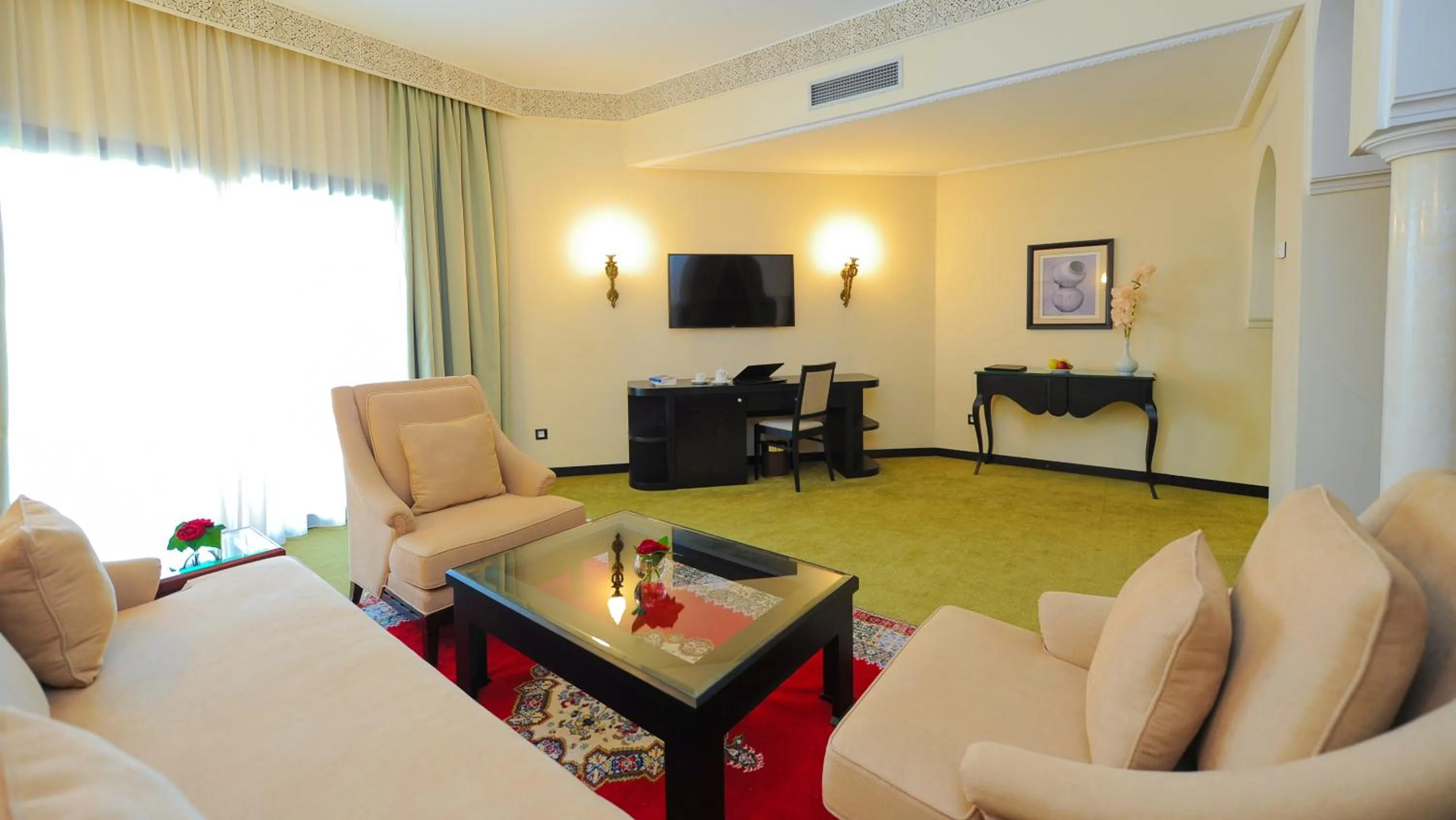 Seating area in Ennakhil Marrakech Hotel & SPA