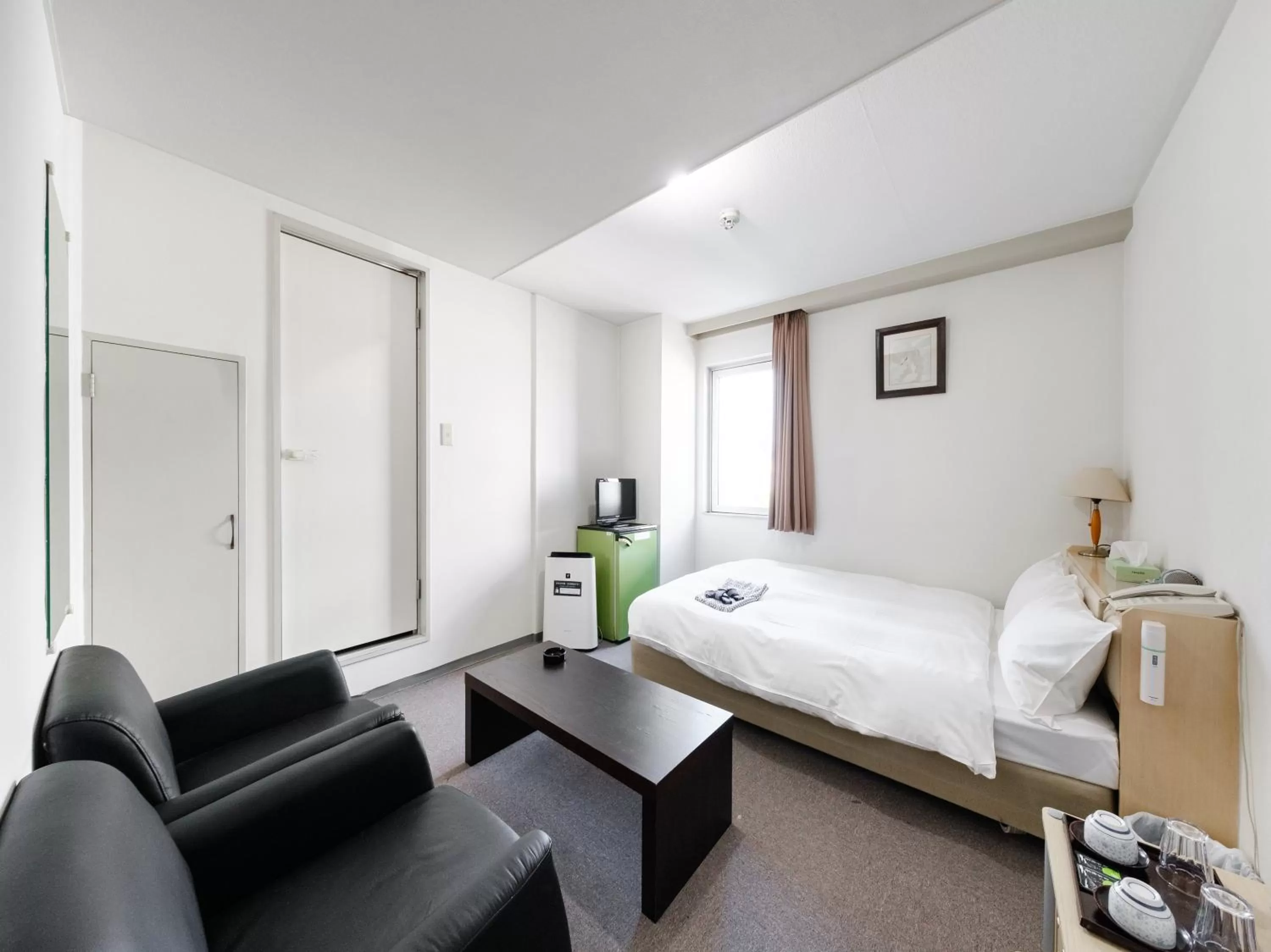 Bed in Tabist THE GREEN ASAHIKAWA