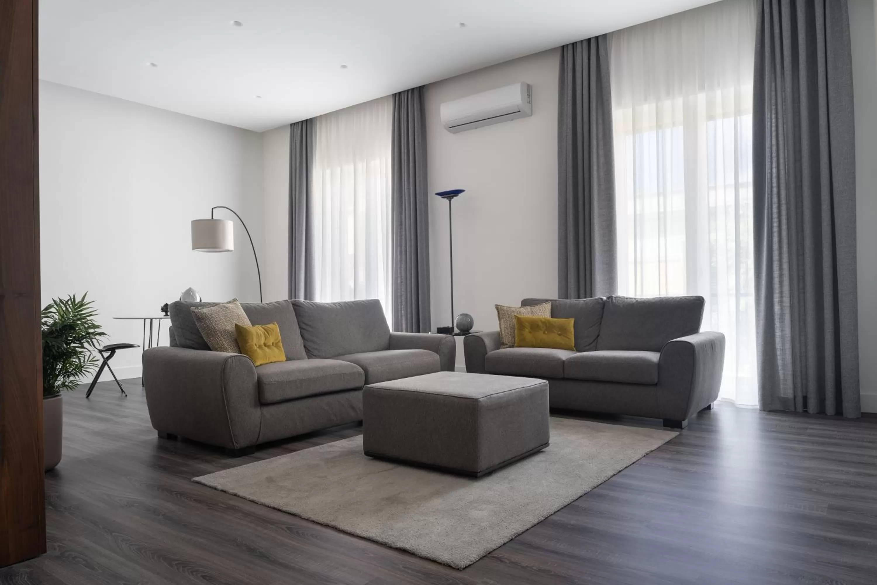 Communal lounge/ TV room, Seating Area in Harmony Luxury Rooms