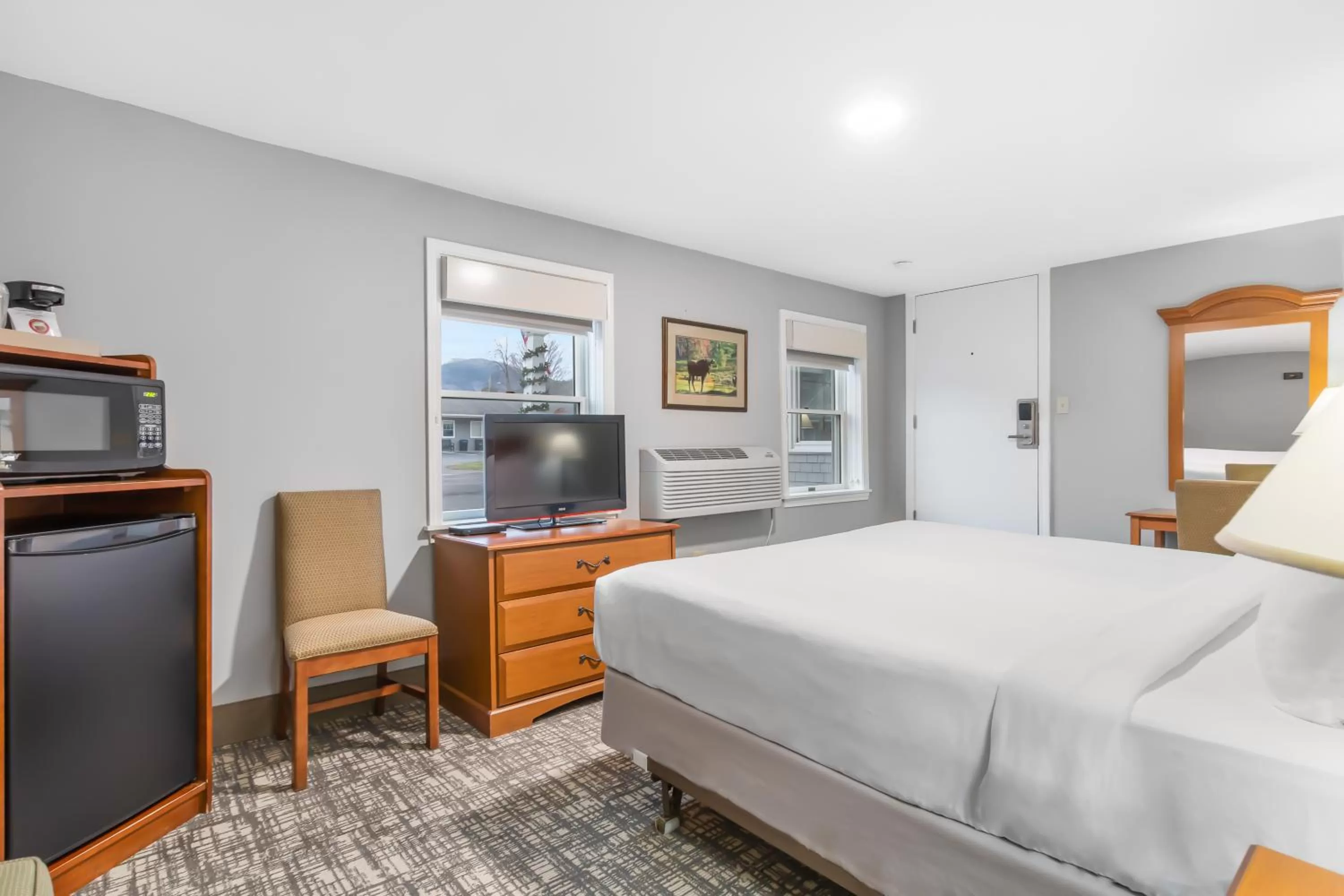 Bed in Top Notch Inn