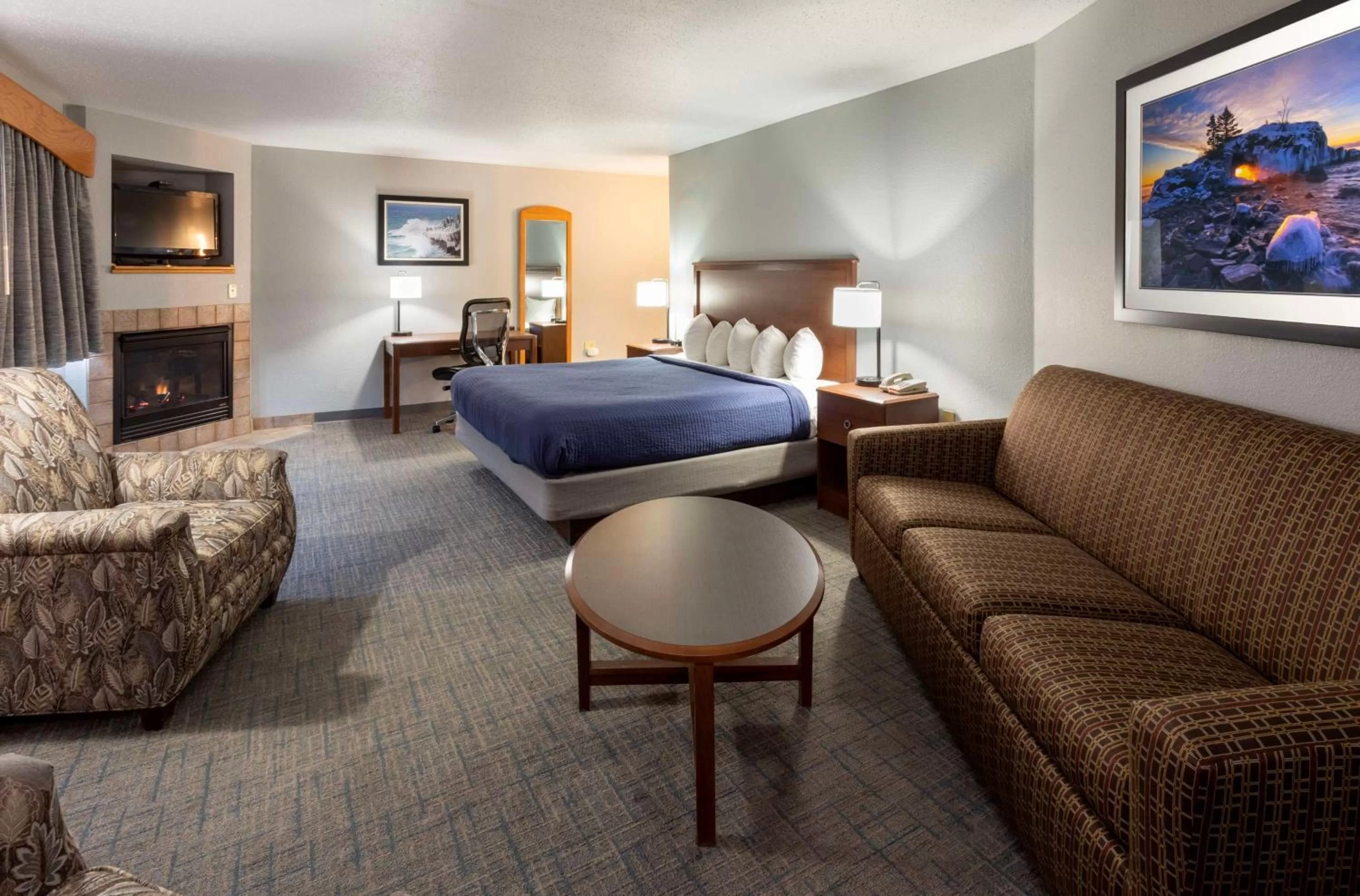 Photo of the whole room, Bed in Black Beach Inn by GrandStay