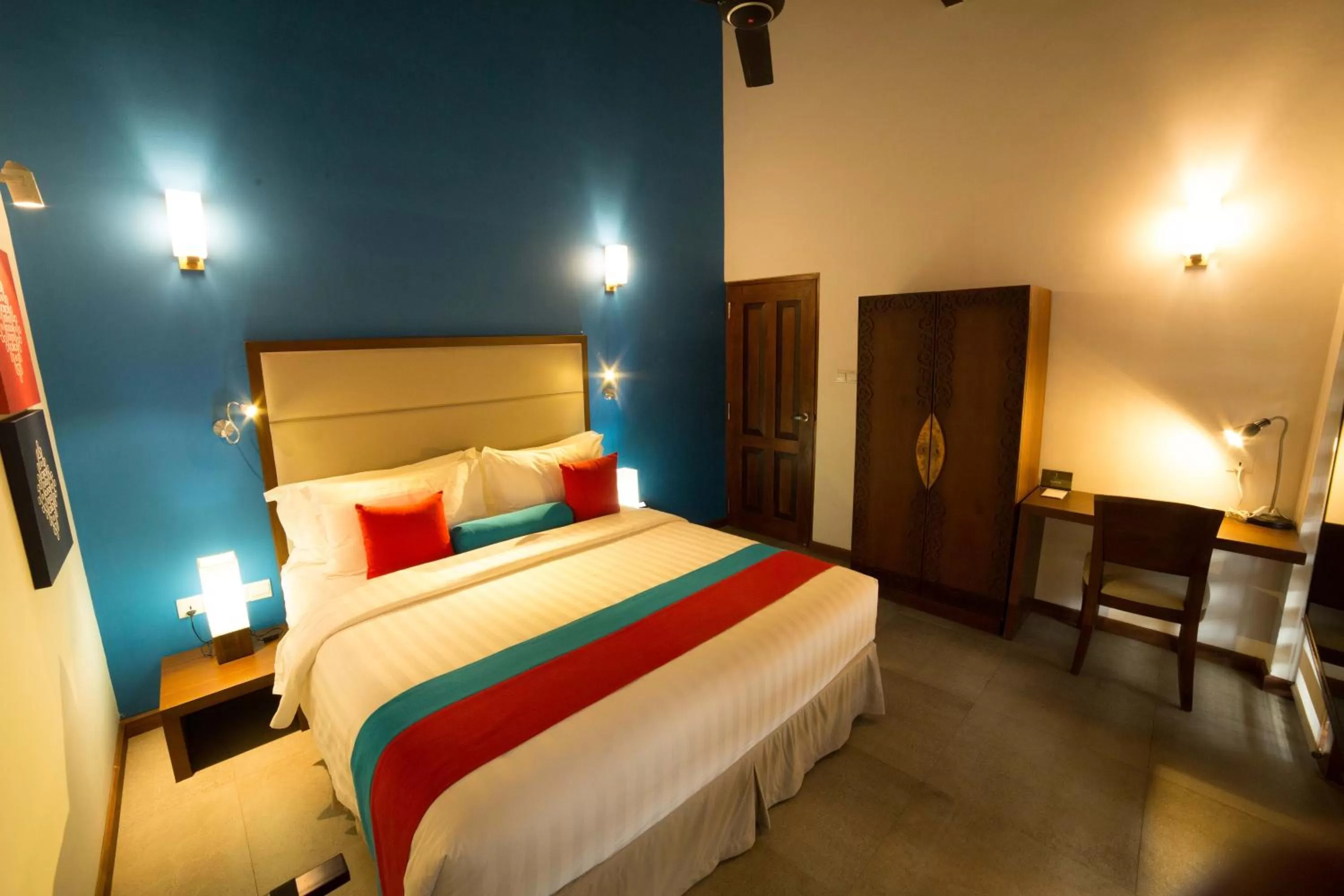 Bed in The Thinnai - All-Suites Boutique Hotel