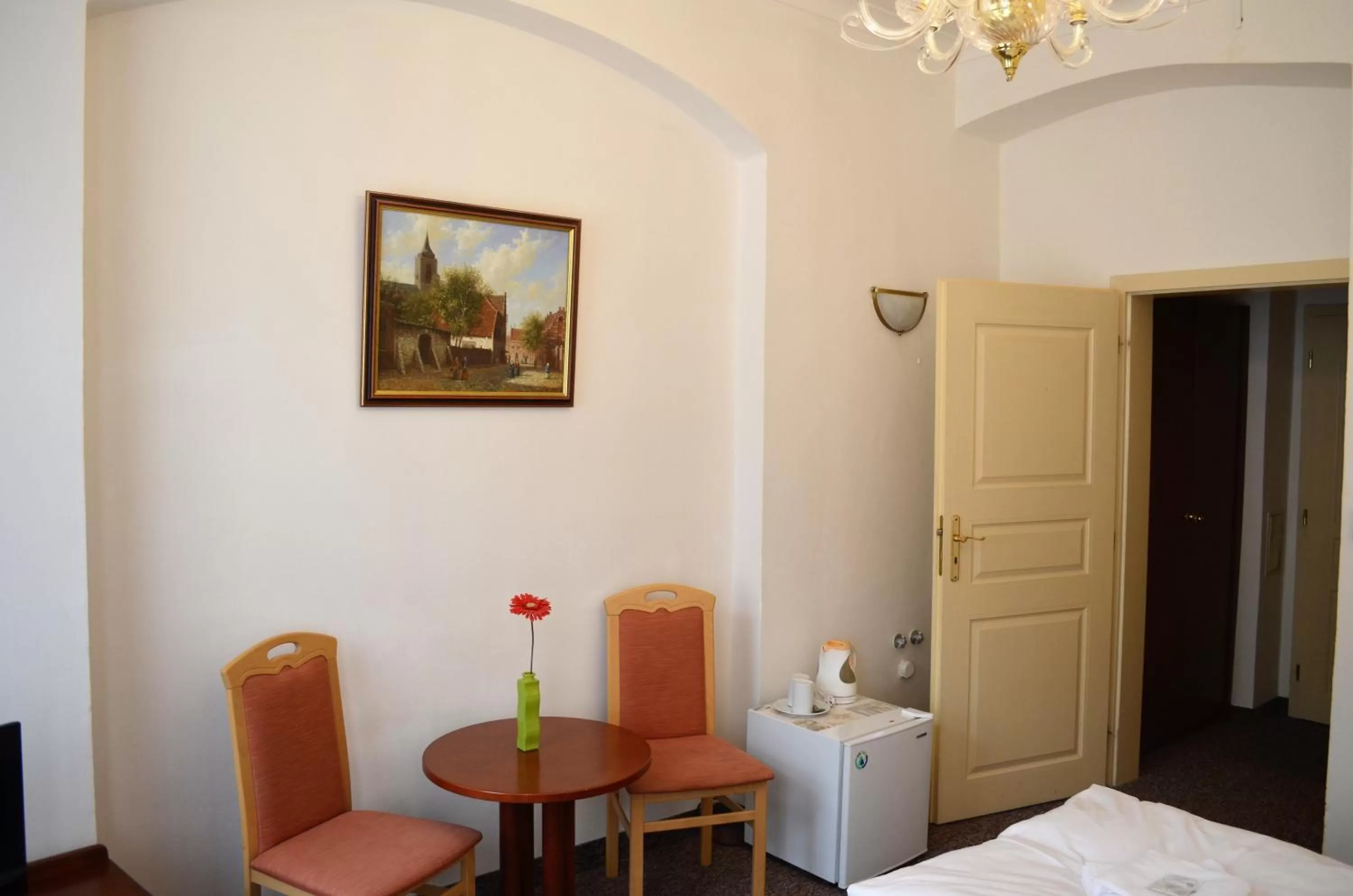 Seating area, Bed in Hotel Petr