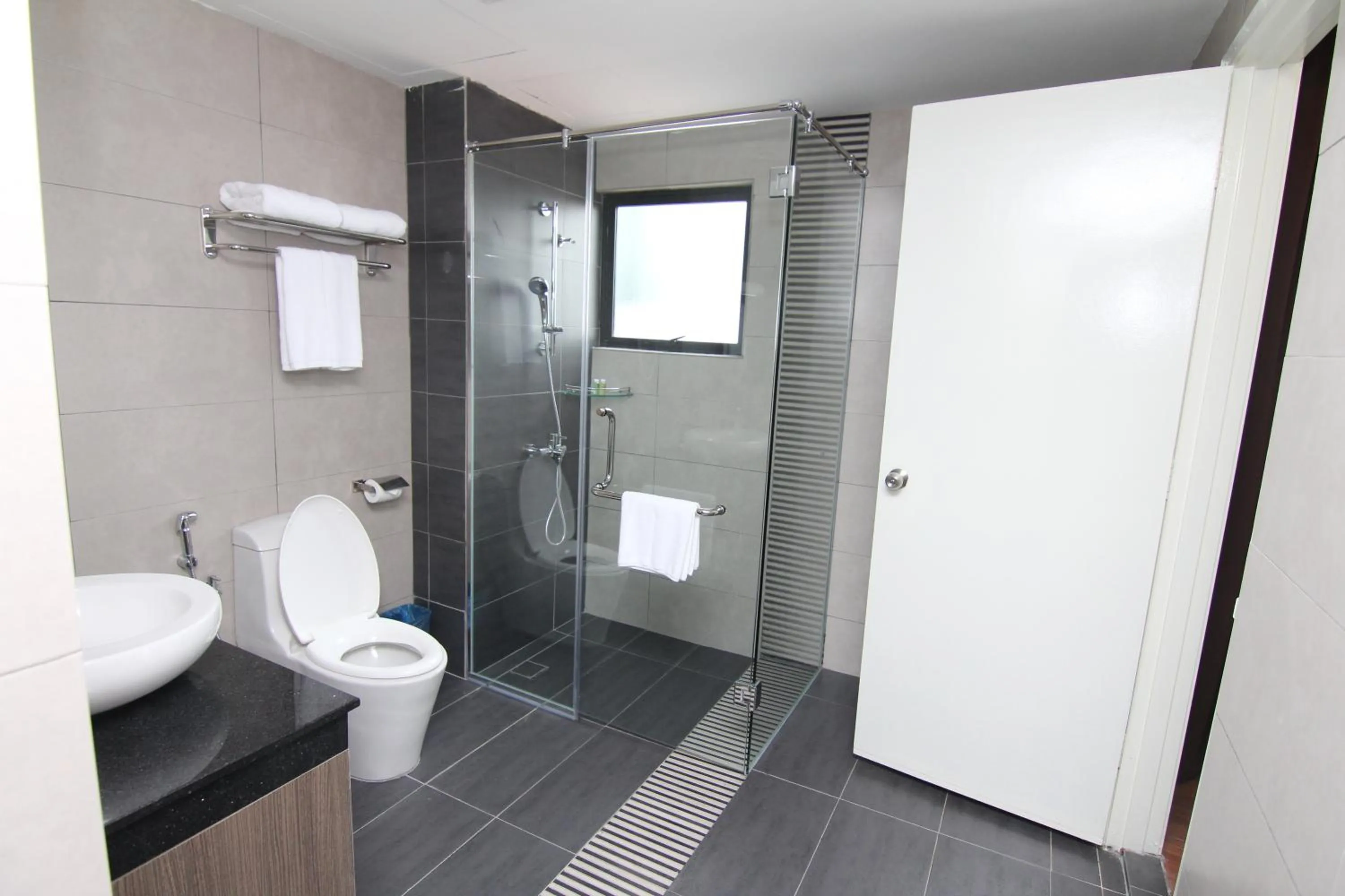 Shower in Nexus Regency Suites & Hotel