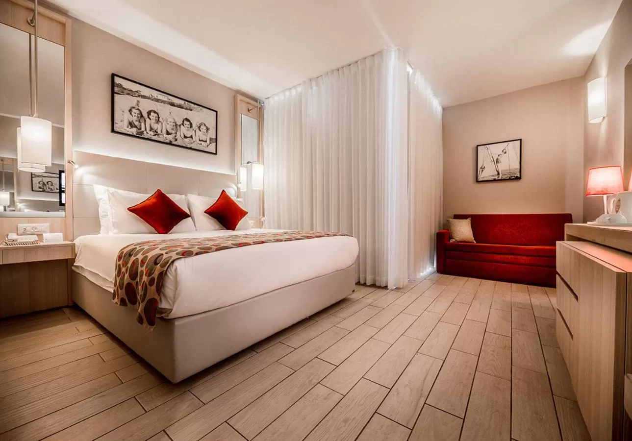 Bed in Astral Maris Hotel