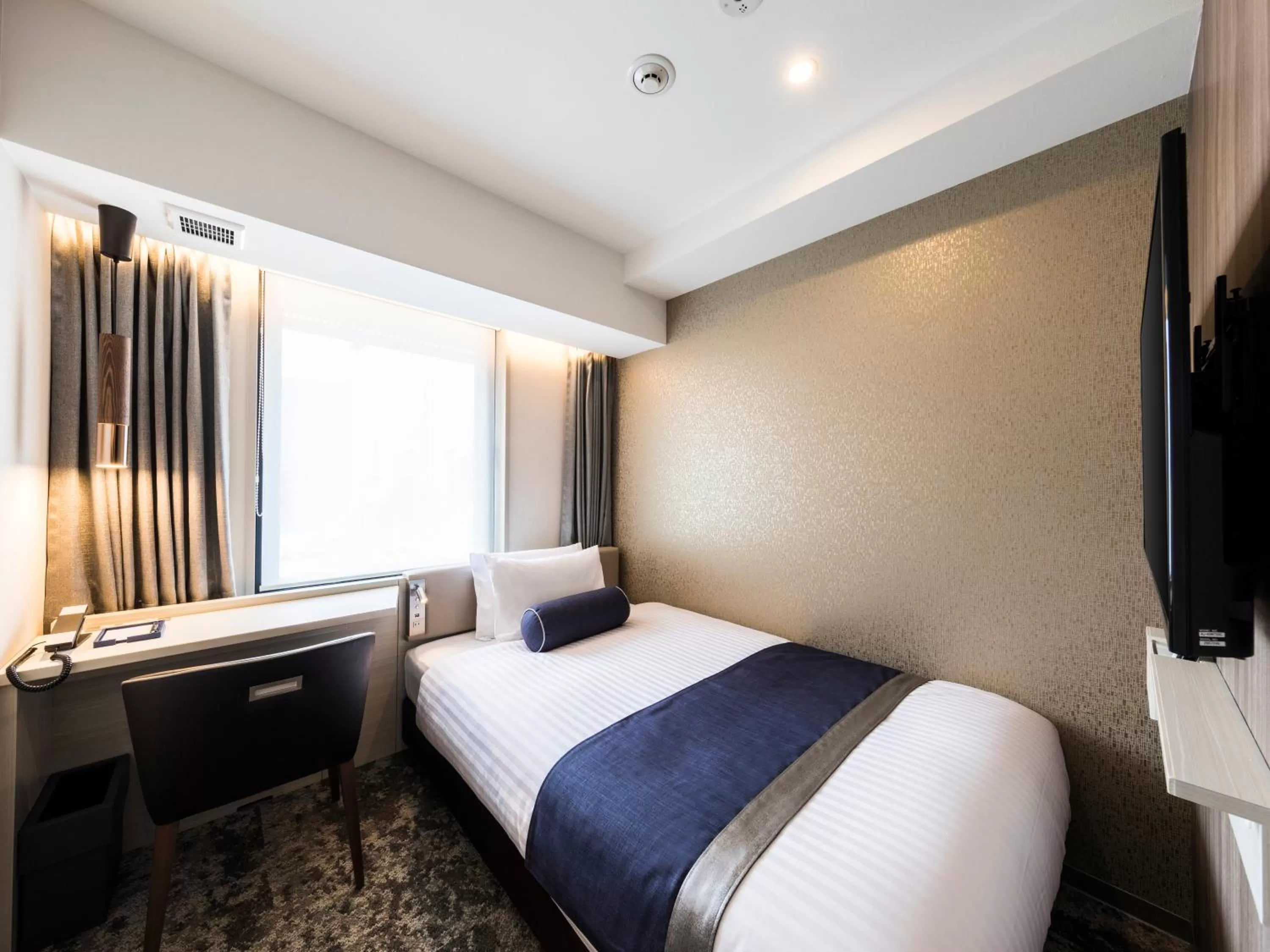 Bed in The Rise Osaka Kitashinchi