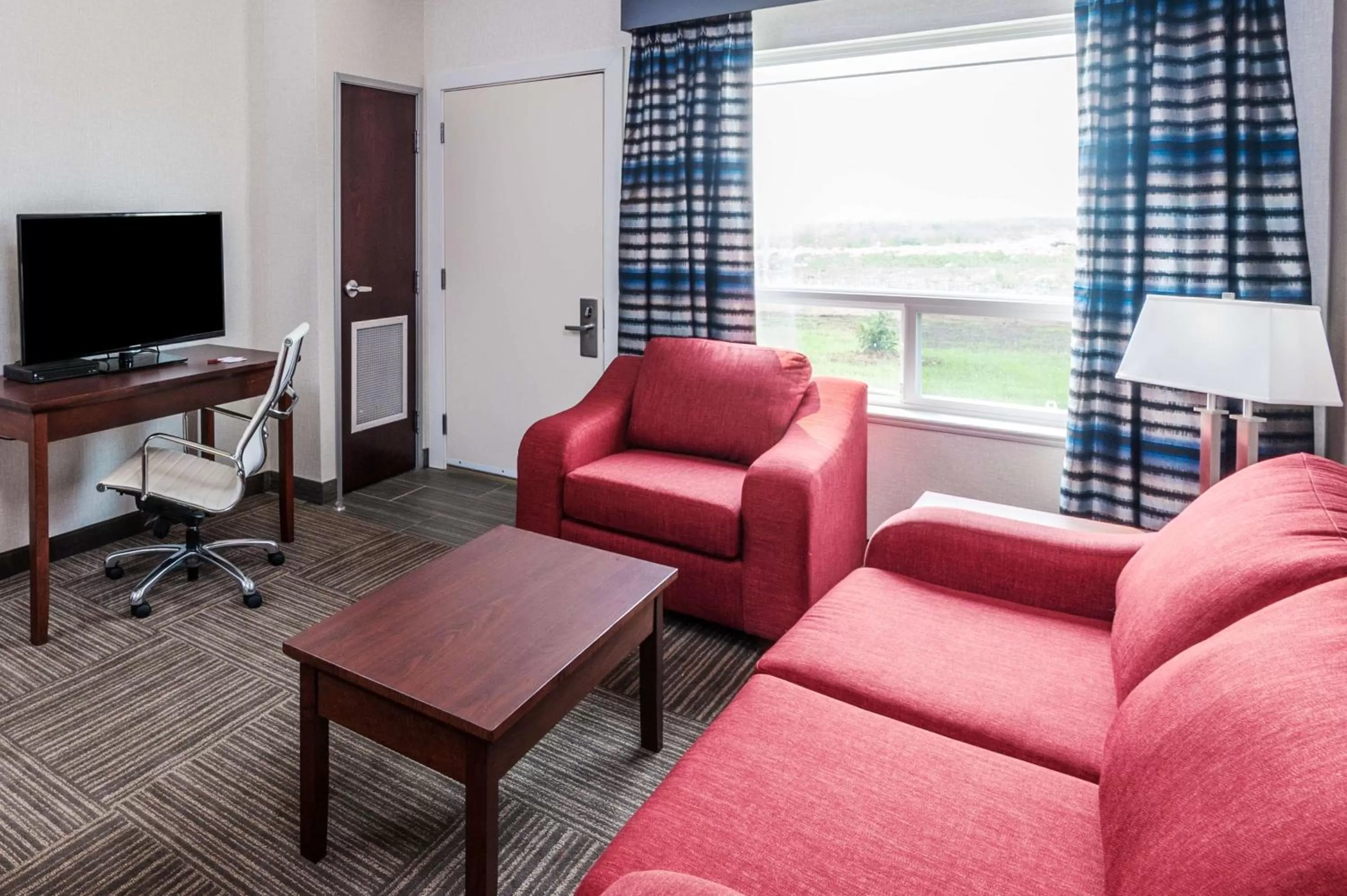 Two-Bedroom Suite with One King and One Queen Beds - Non-Smoking in Ramada by Wyndham Moose Jaw