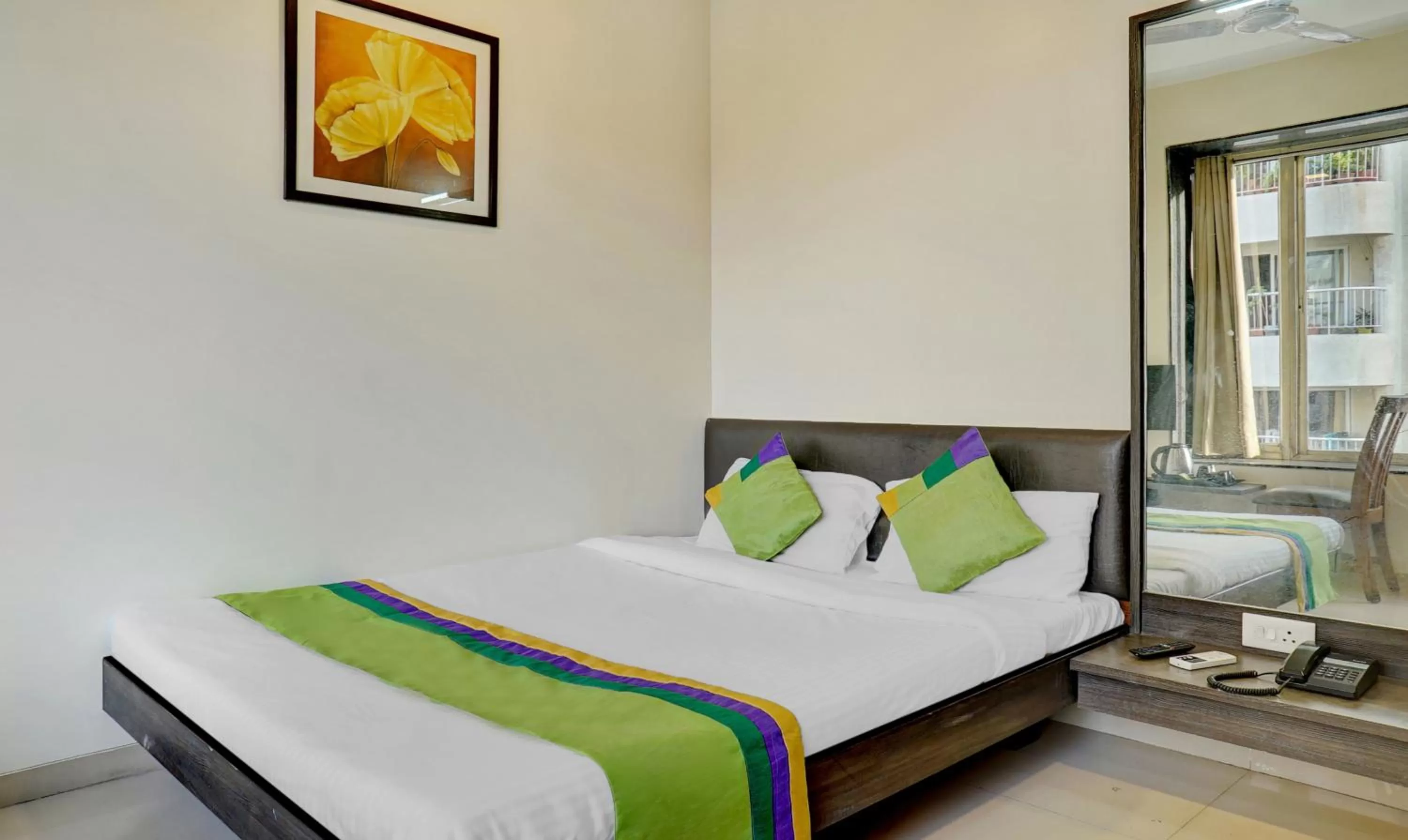 Bedroom, Bed in Treebo Bhagyashree Executive