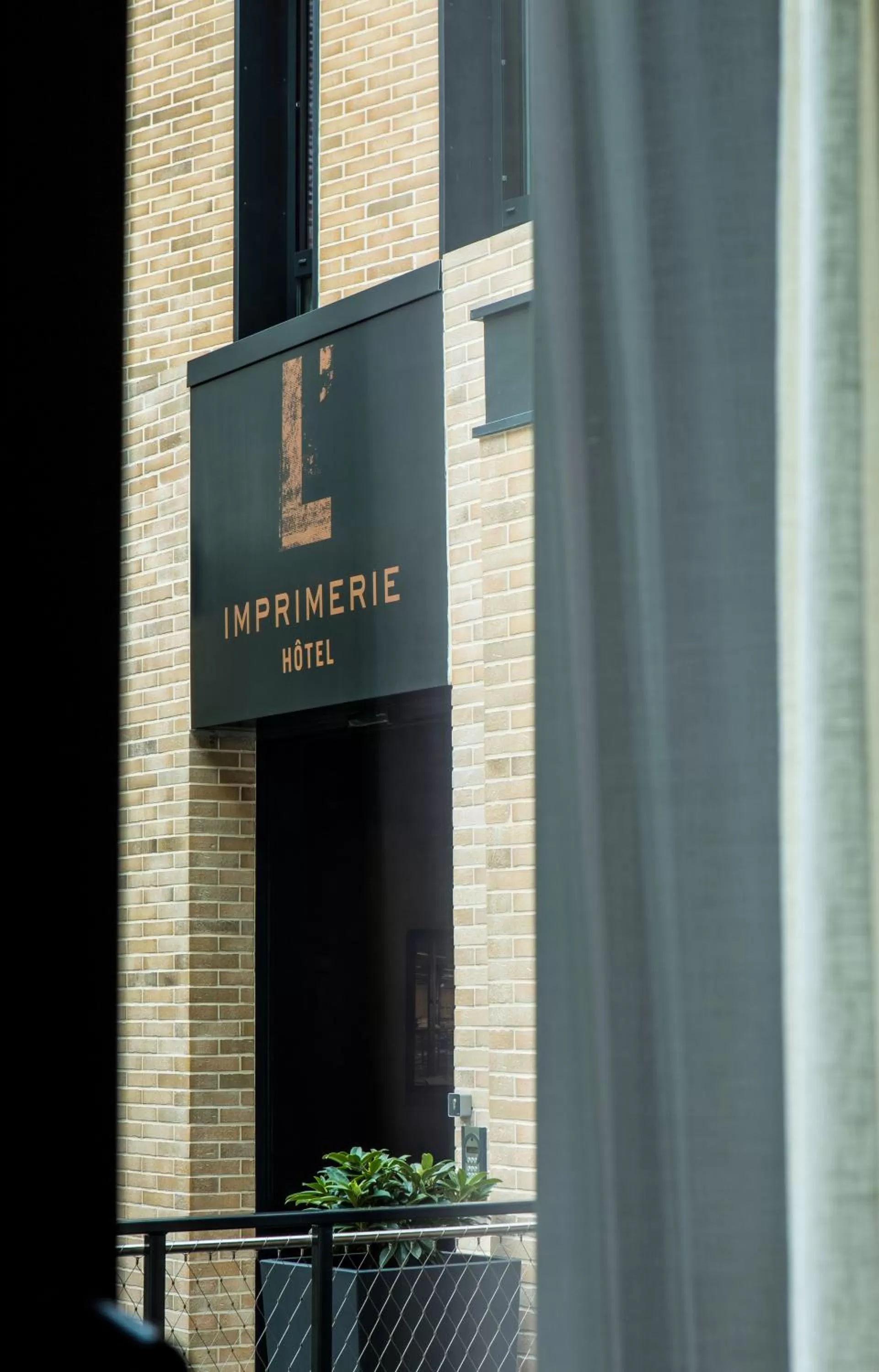 Property logo or sign in L'Imprimerie Hôtel