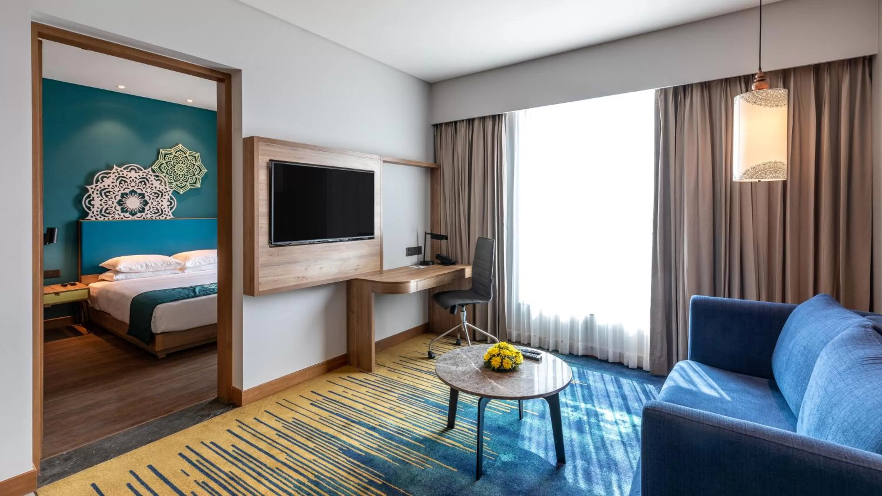 Living room, Bed in Grand Mercure Ahmedabad GIFT City - An Accor Hotels Brand