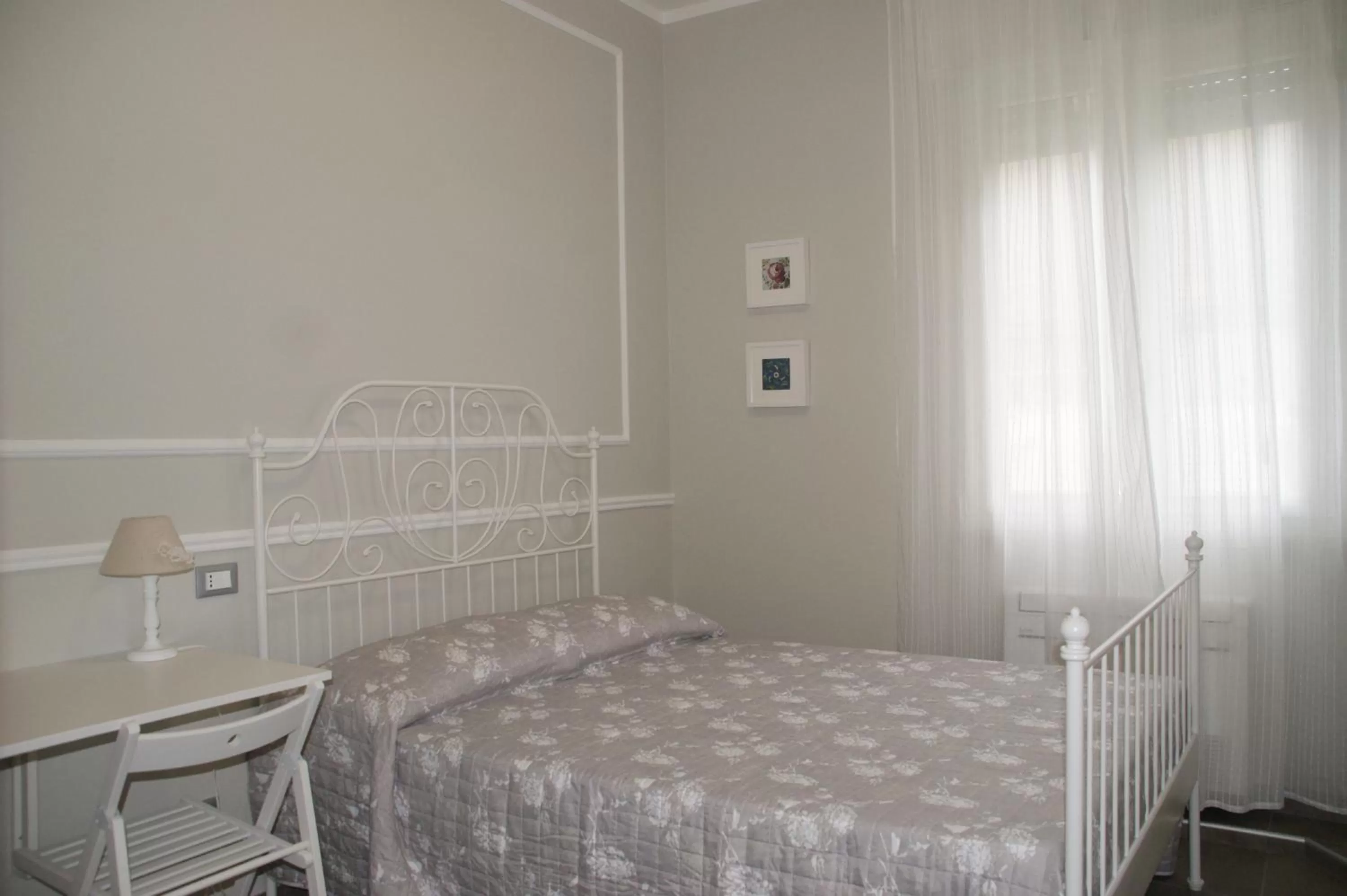 Bed in LA DAMA ROOM&BREAKFAST