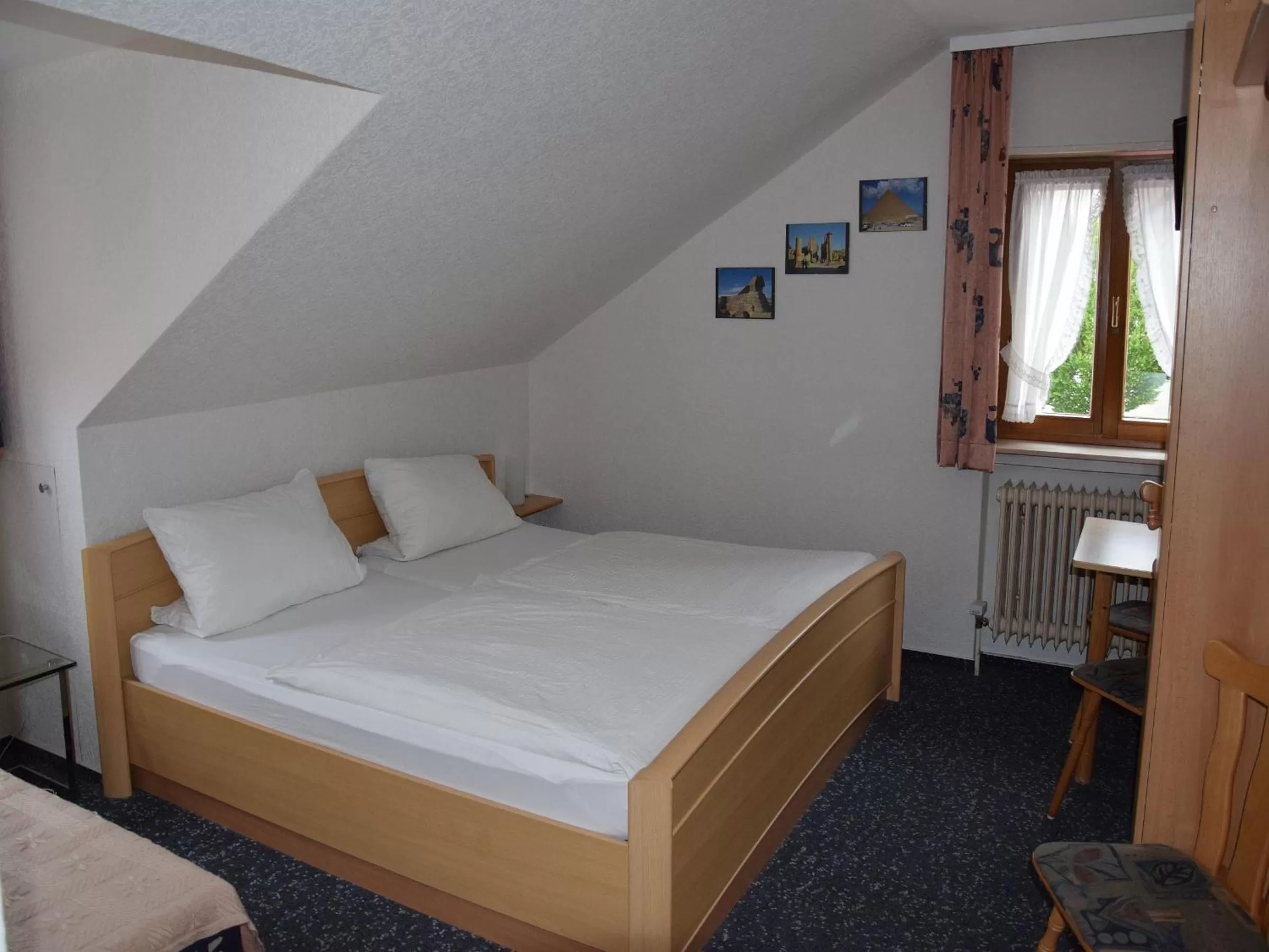 Photo of the whole room, Bed in Hotel Gästehaus Sonne
