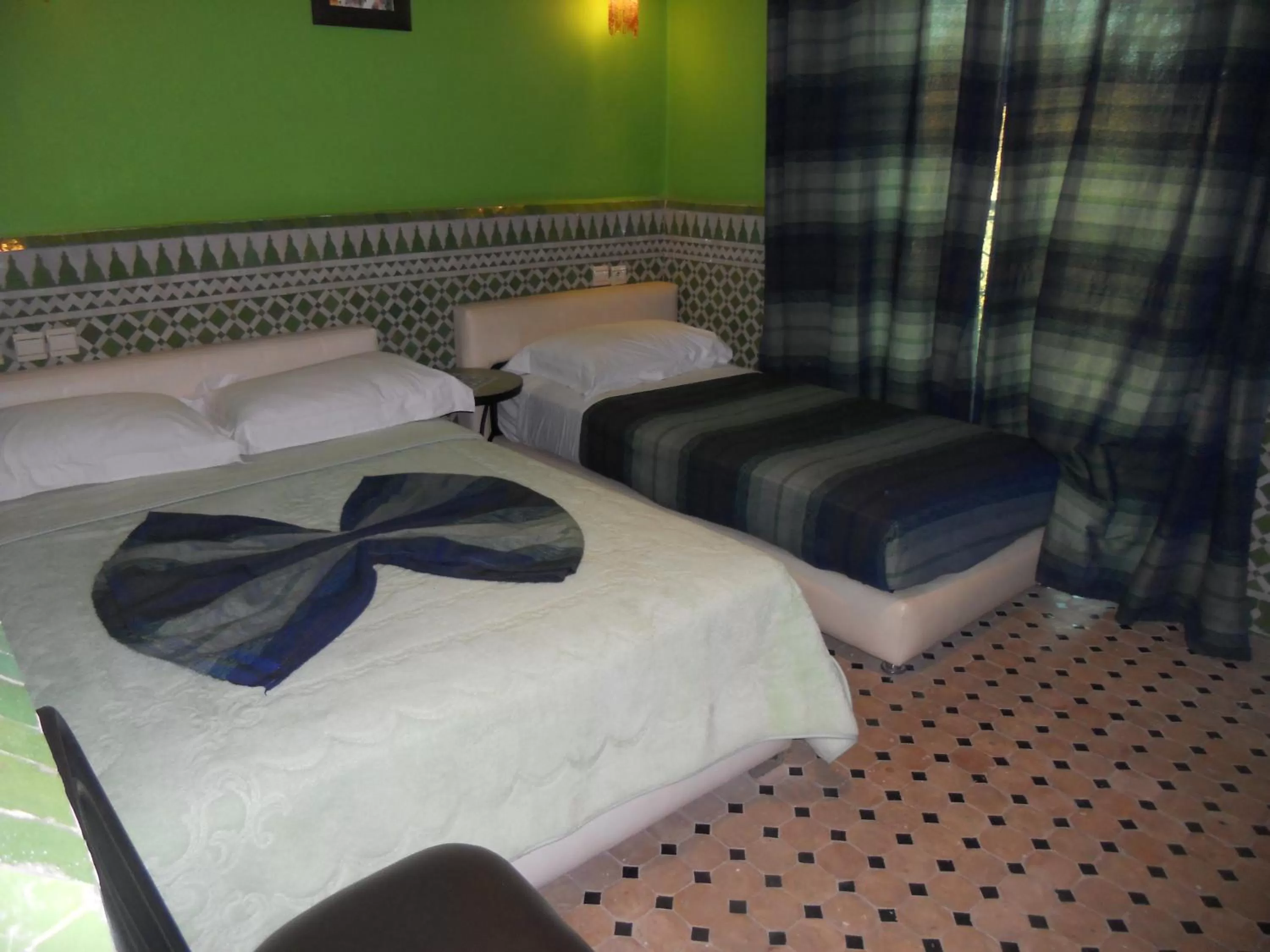 Bed in Riad Passiflora