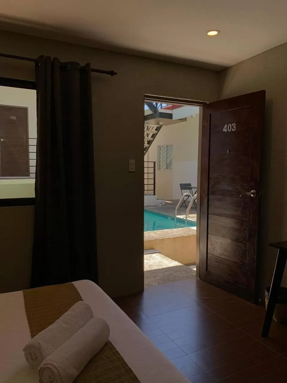 Pool view, Bed in Vela Terraces Hotel