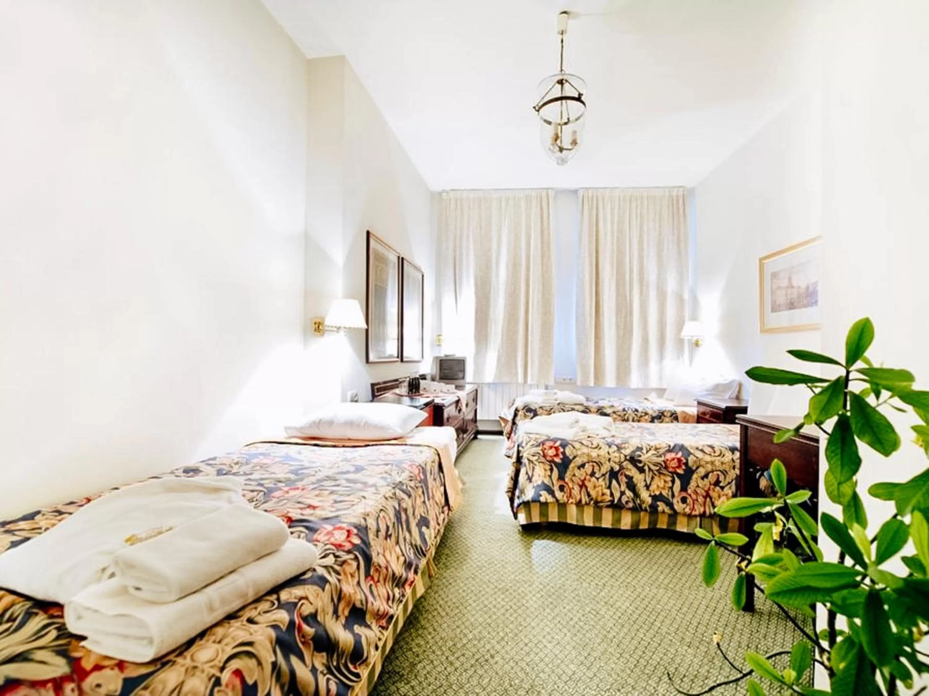 Bed in Miodosytnia Aparthotel