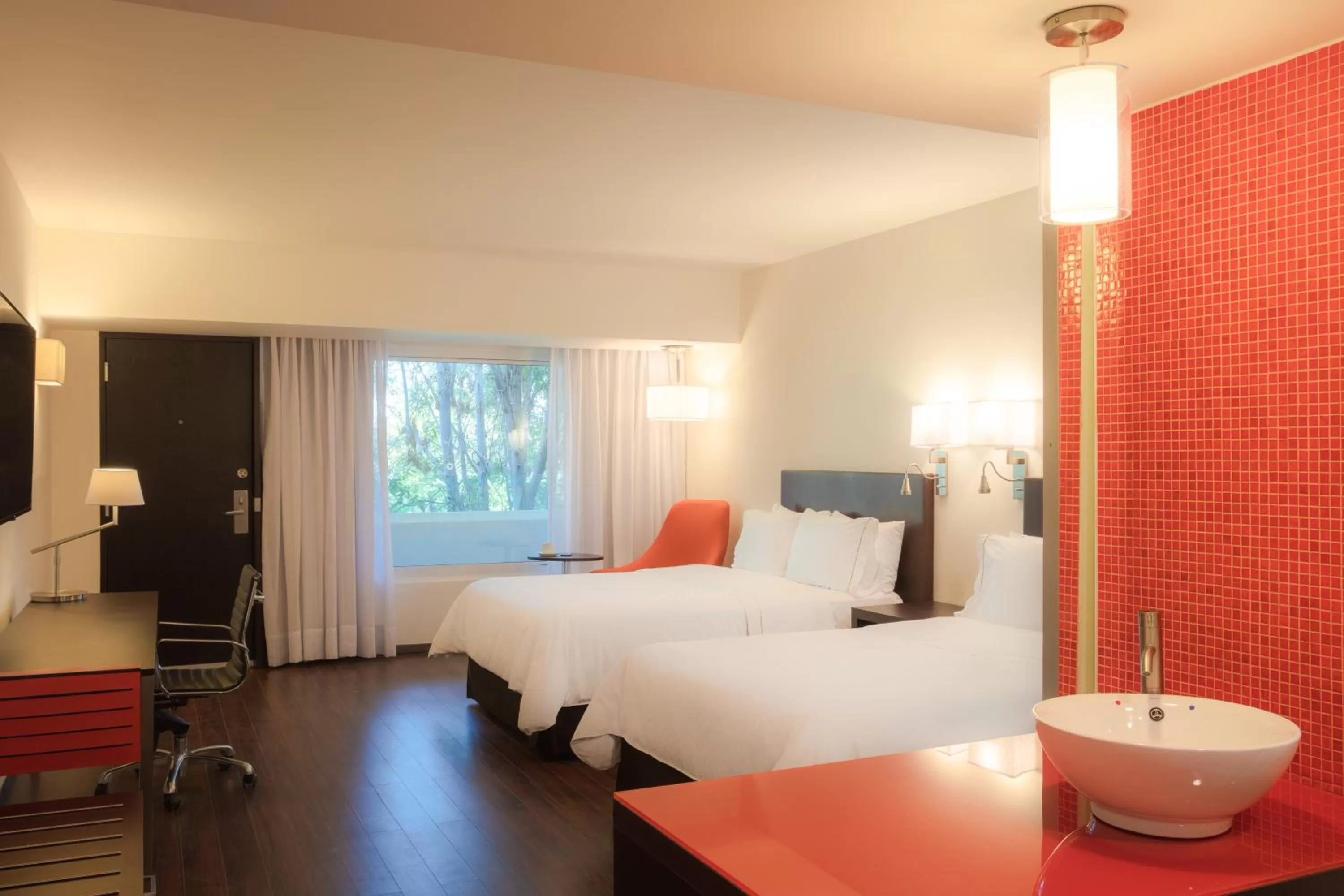 Photo of the whole room, Bed in Fiesta Inn San Luis Potosi Glorieta Juarez