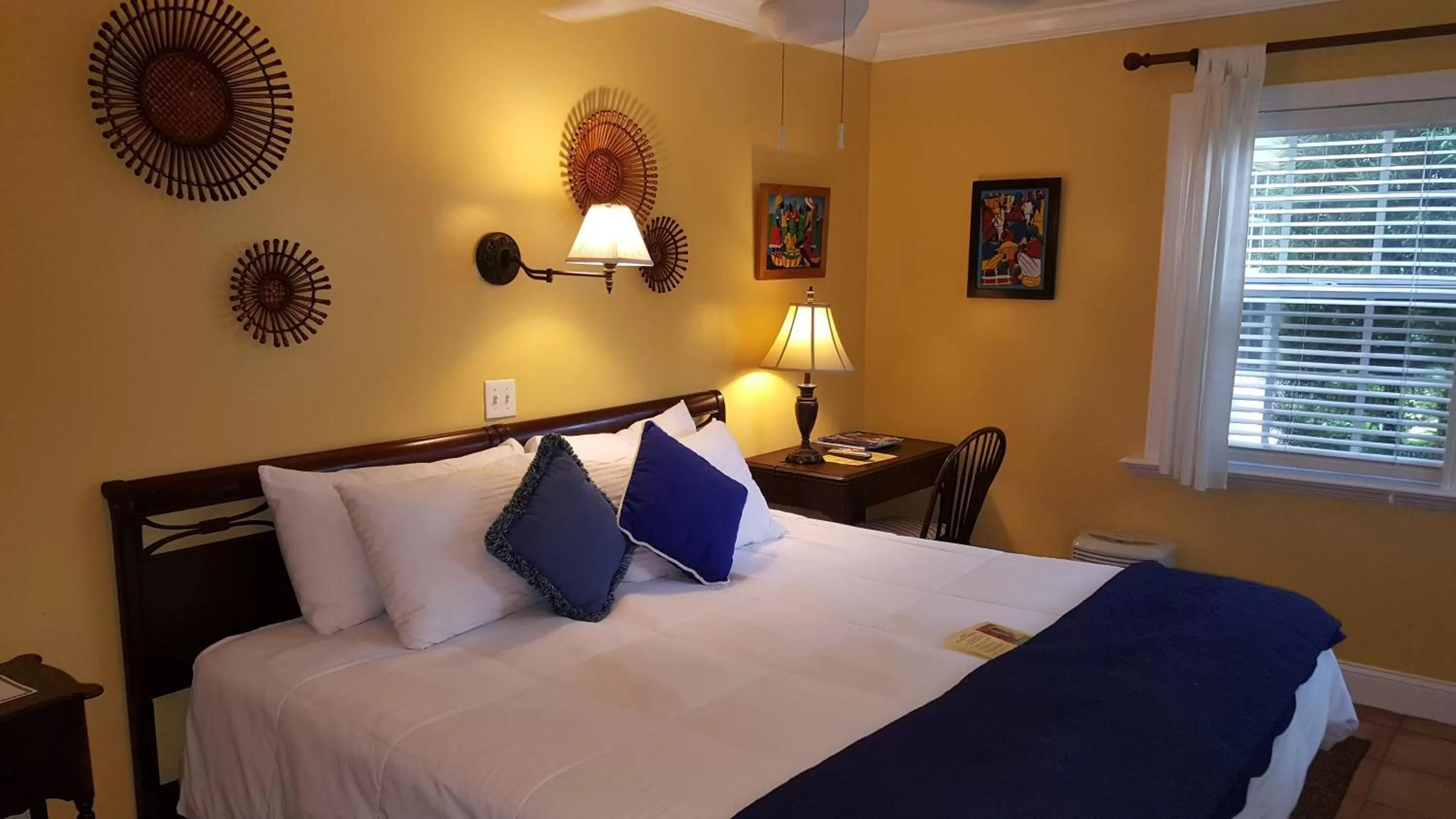 Photo of the whole room, Bed in The Caribbean Court Boutique Hotel