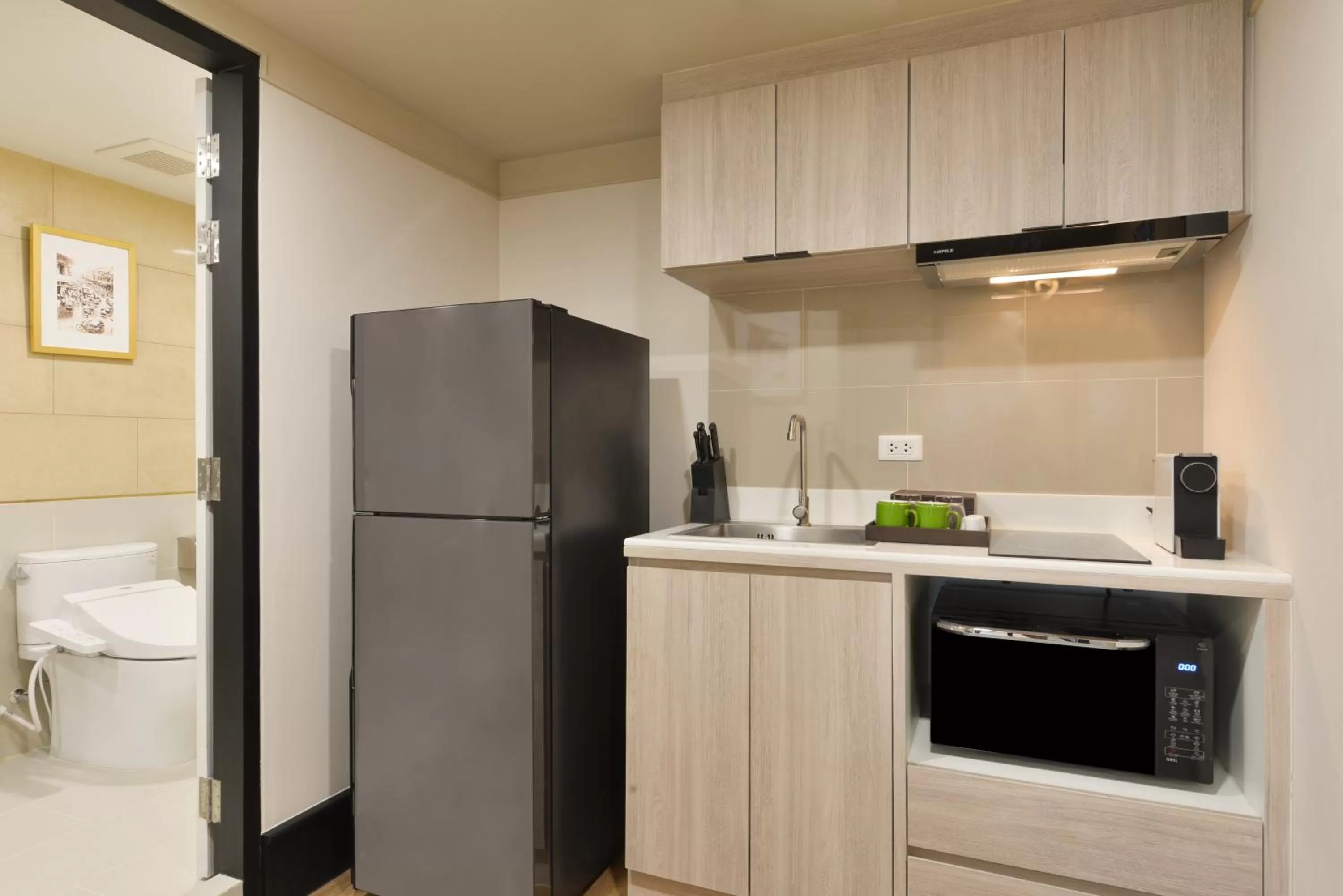 Kitchen or kitchenette in Oakwood Hotel & Residence Bangkok