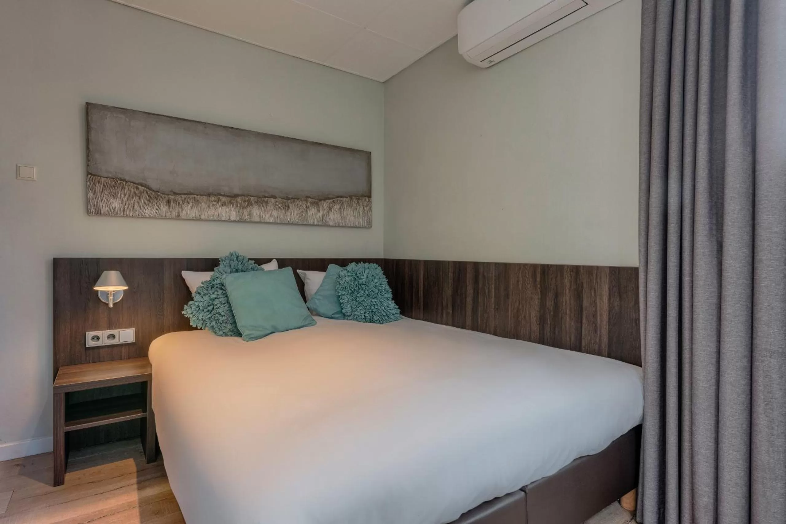 Bed in Hotel Damsquare