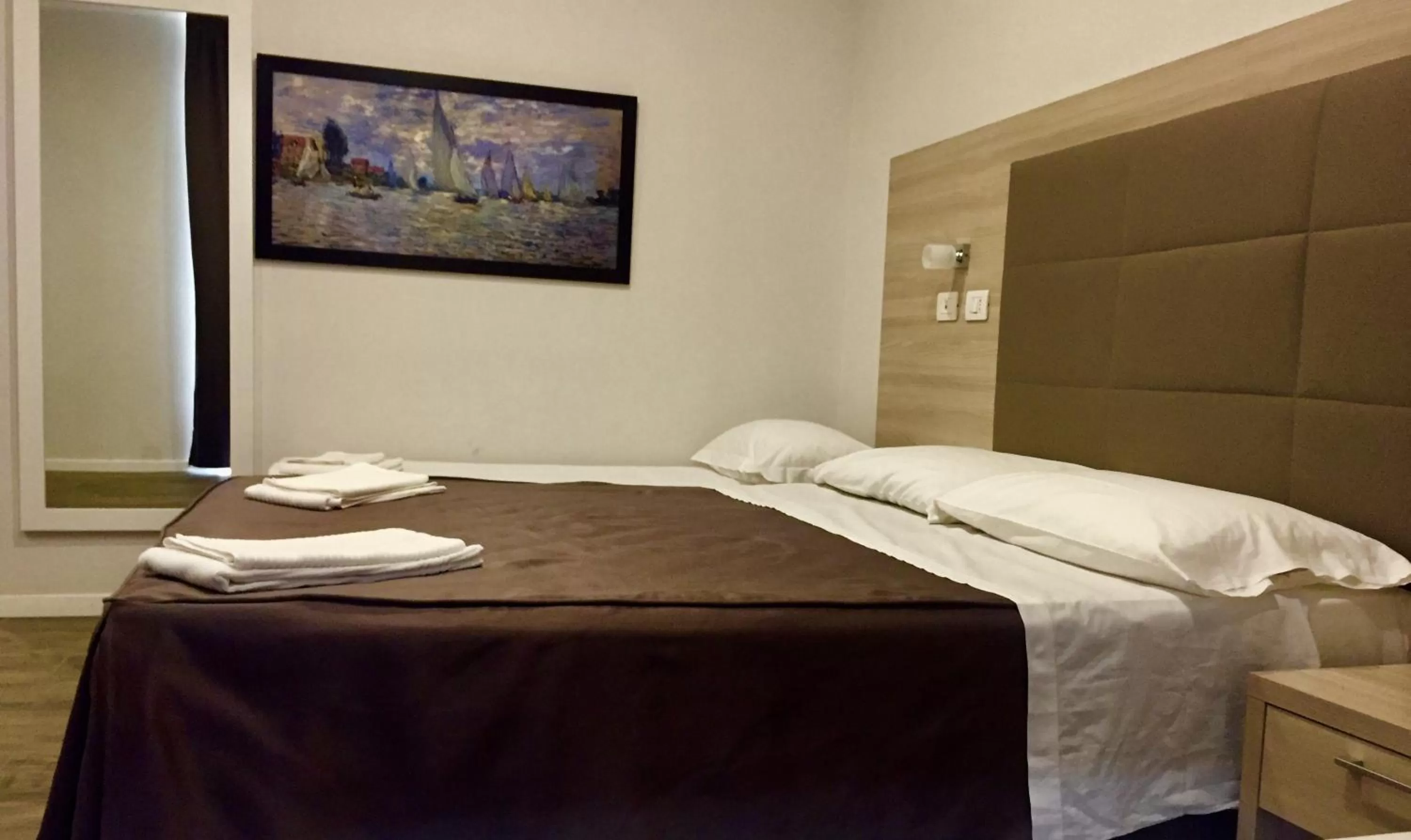 Bed in Academy Hotel