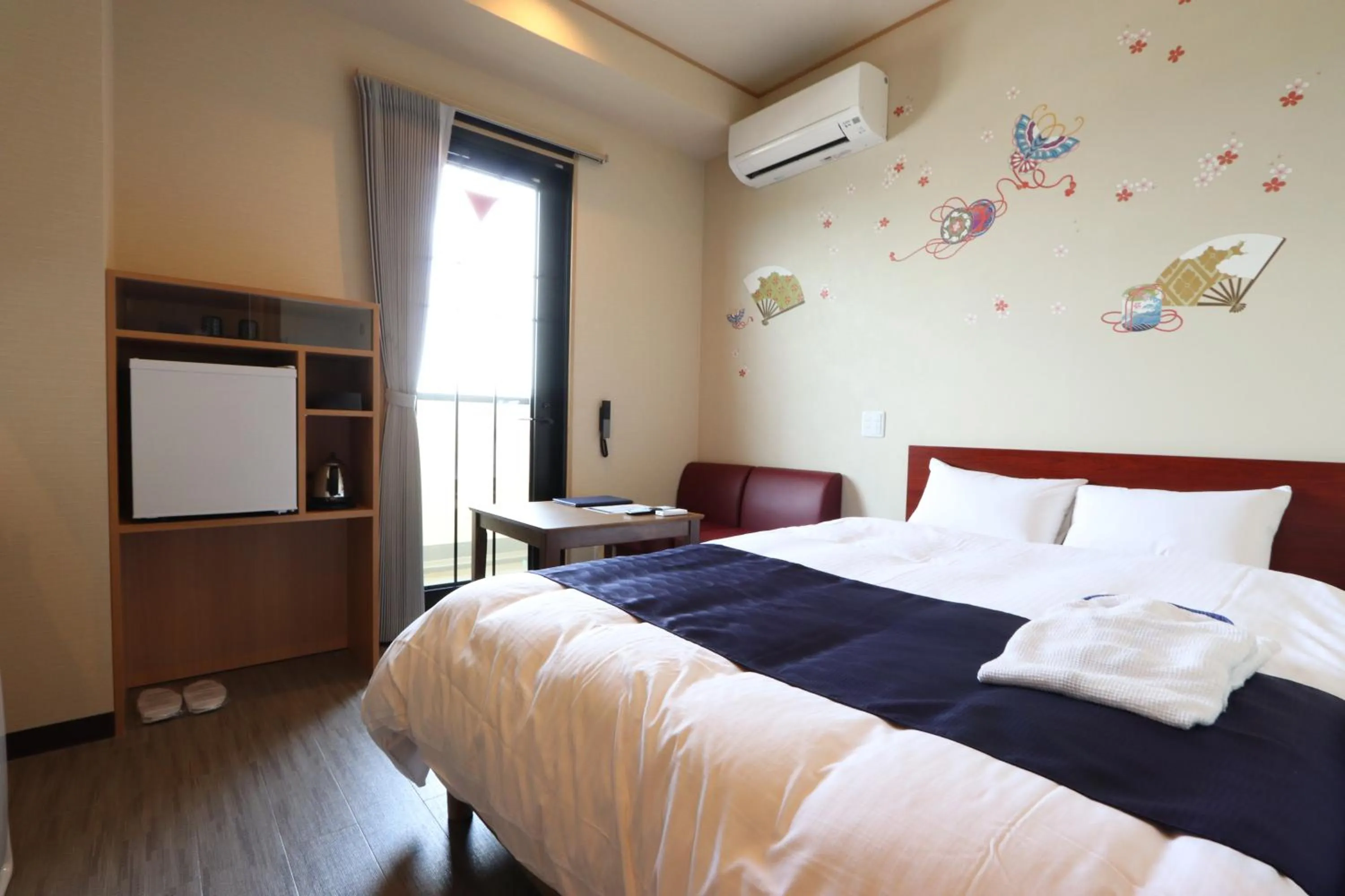 Photo of the whole room, Bed in Hotel Kanade Kanku Kaizuka