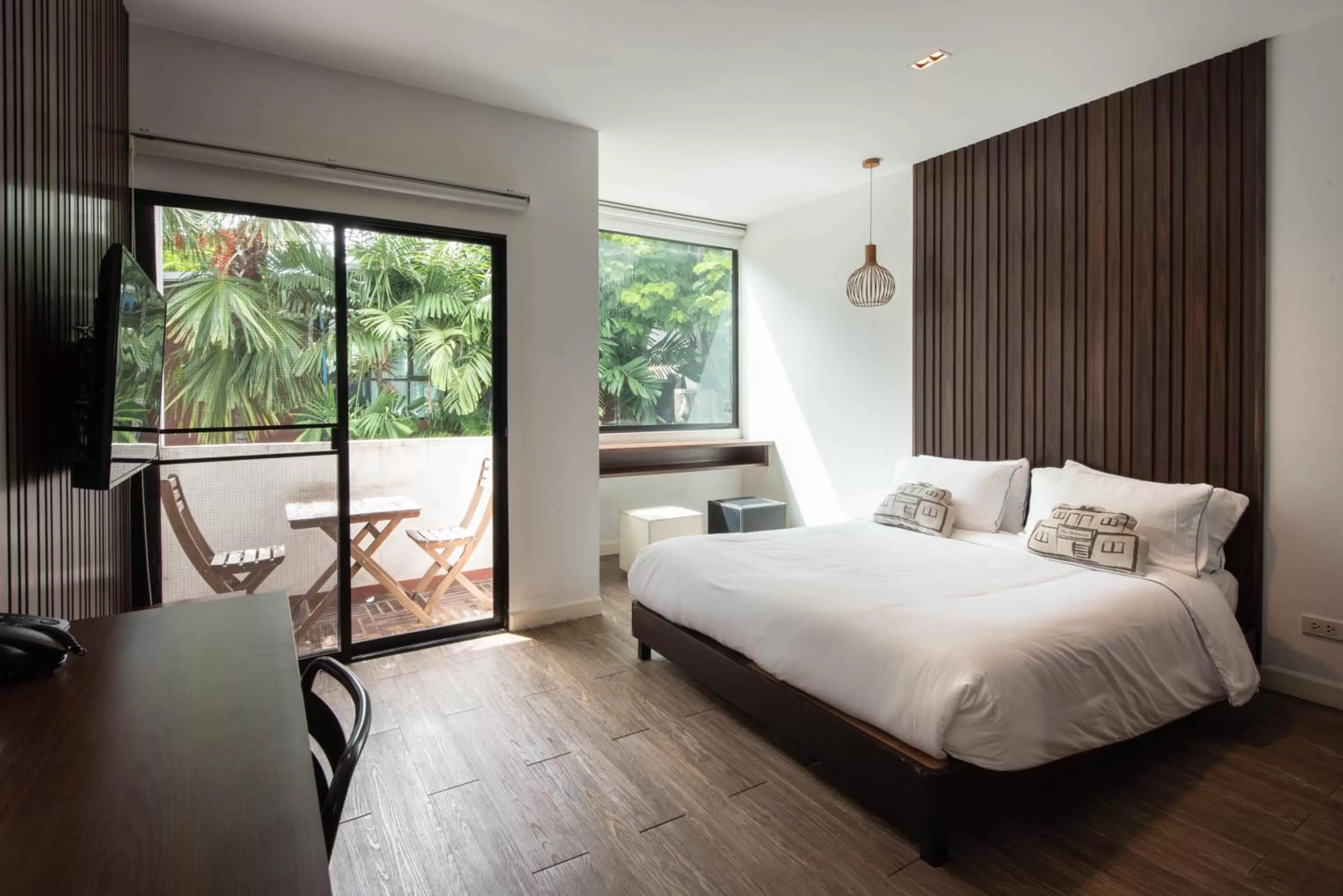 Bed in Botanic Service Room at Impact Muangthongthani - SHA Certified