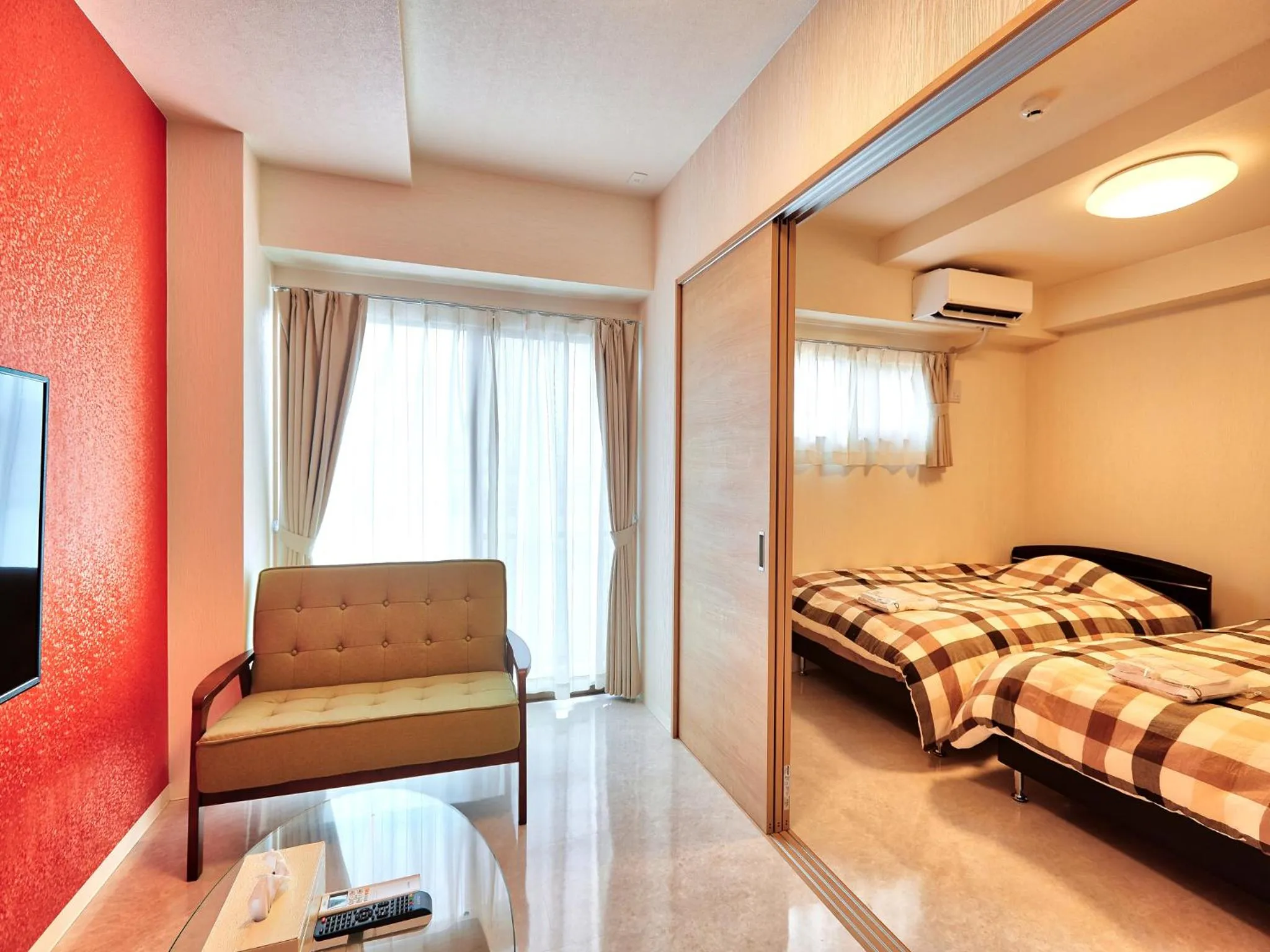 Living room, Bed in Mango Resort Okinawa Chatan