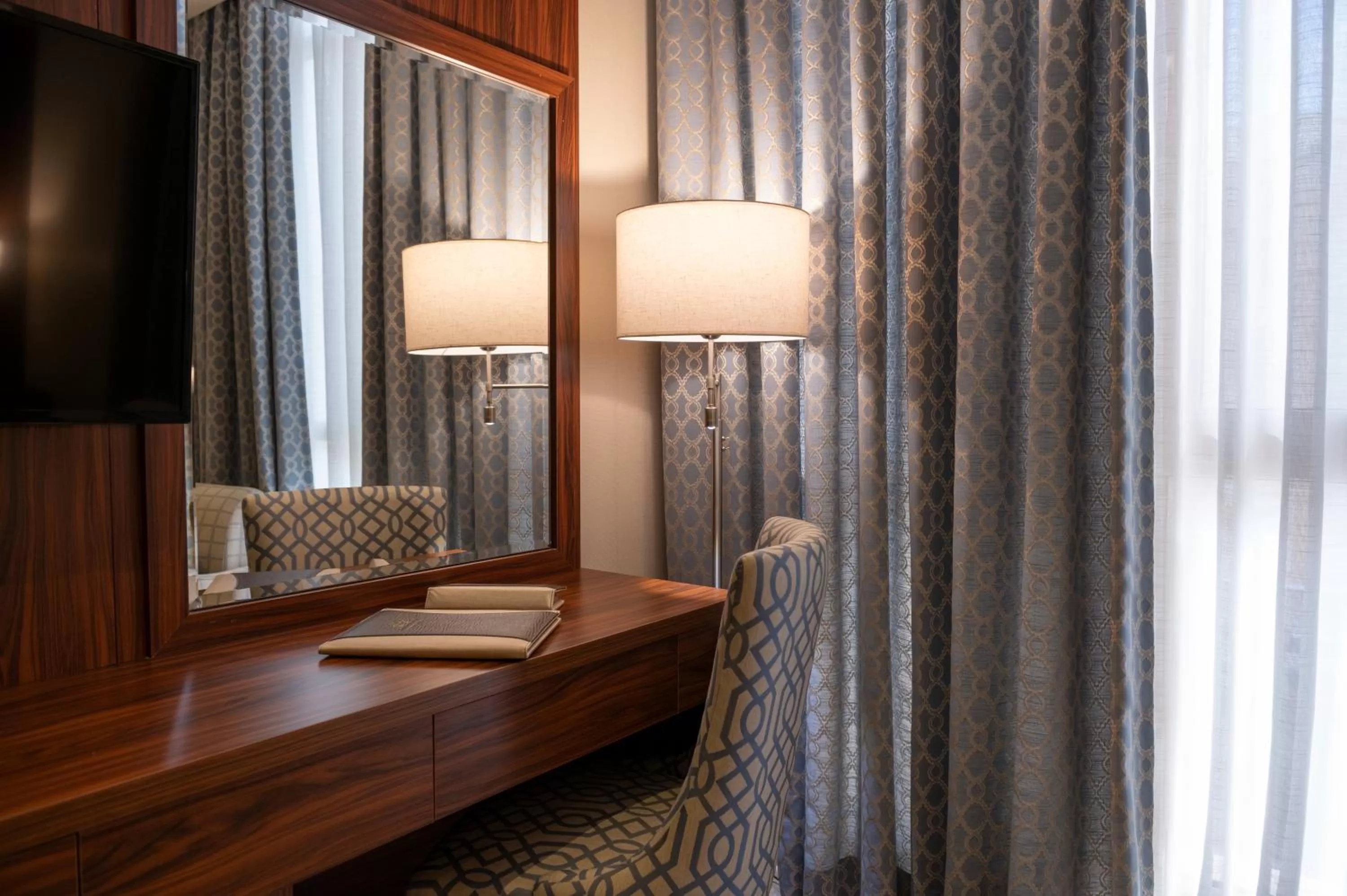 TV/Entertainment Center in Seasons Park Hotel