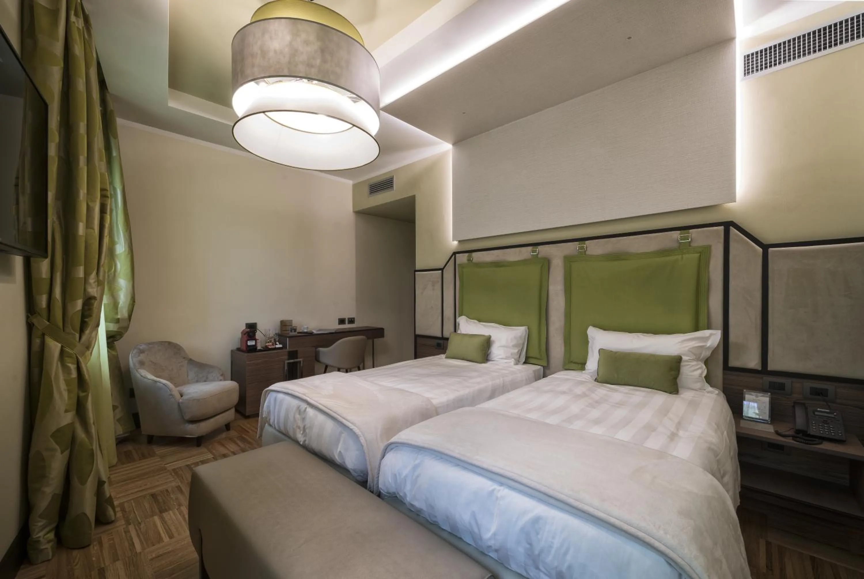 Coffee/tea facilities, Bed in Solo Experience Hotel